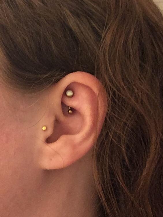 First jewelry change on 10 month old rook and tragus r/piercing