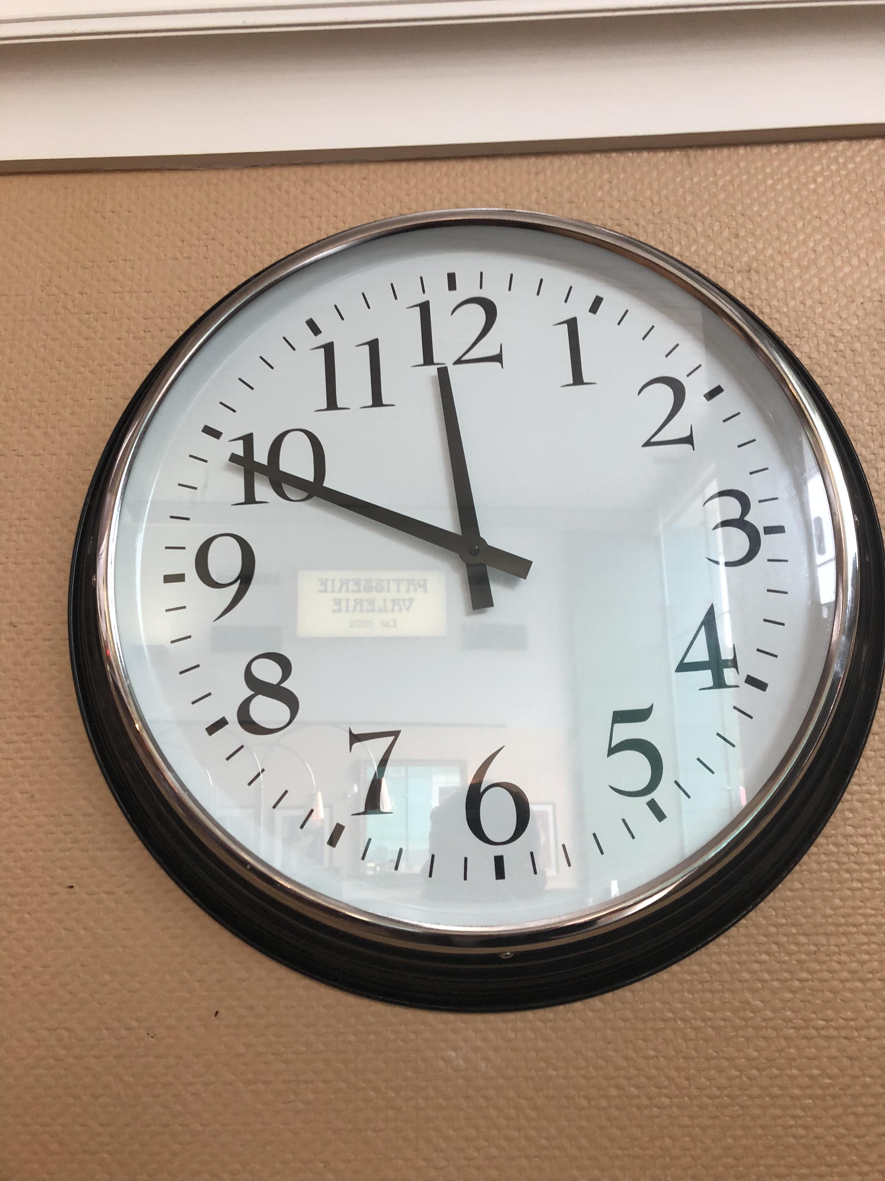 Can anyone identify this brand of clock? Seen it in a few places