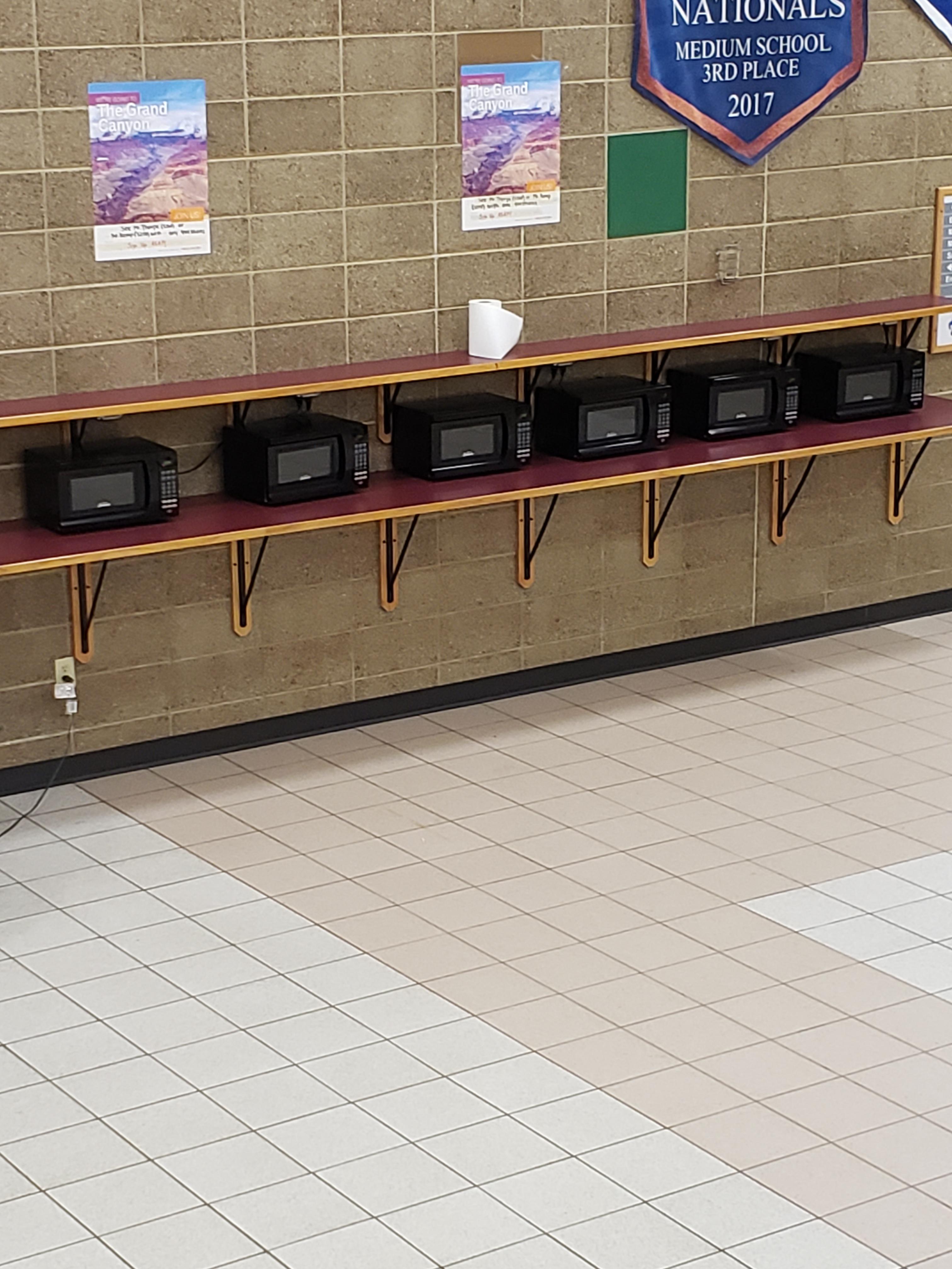 A high school in Wisconsin(water town) has microwaves set up for people