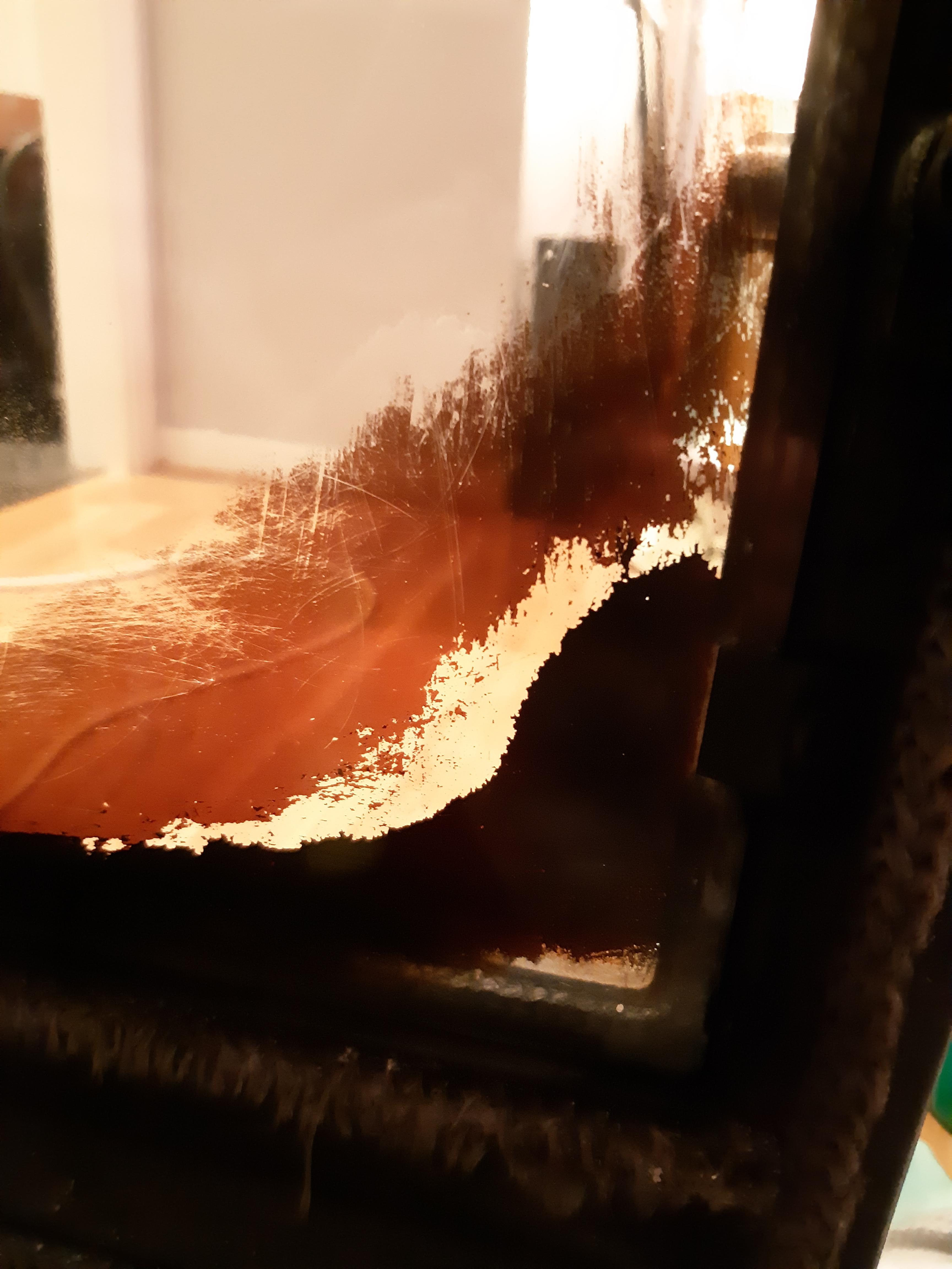 This is from the glass from my wood burning fireplace. I can't seem to get it off with anything