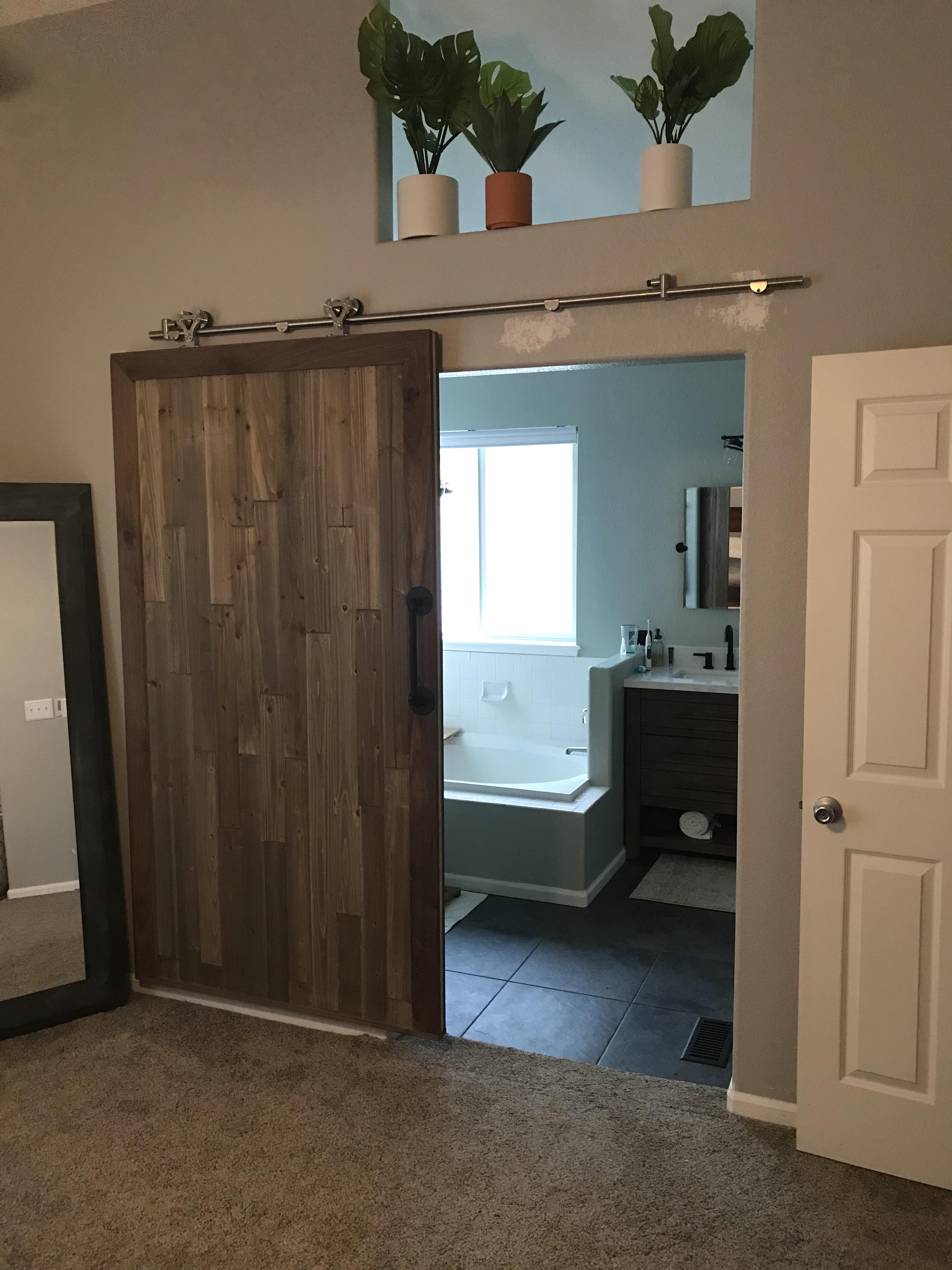 DIY Barn Door Walnut trim, reclaimed wood shiplap with a pine core