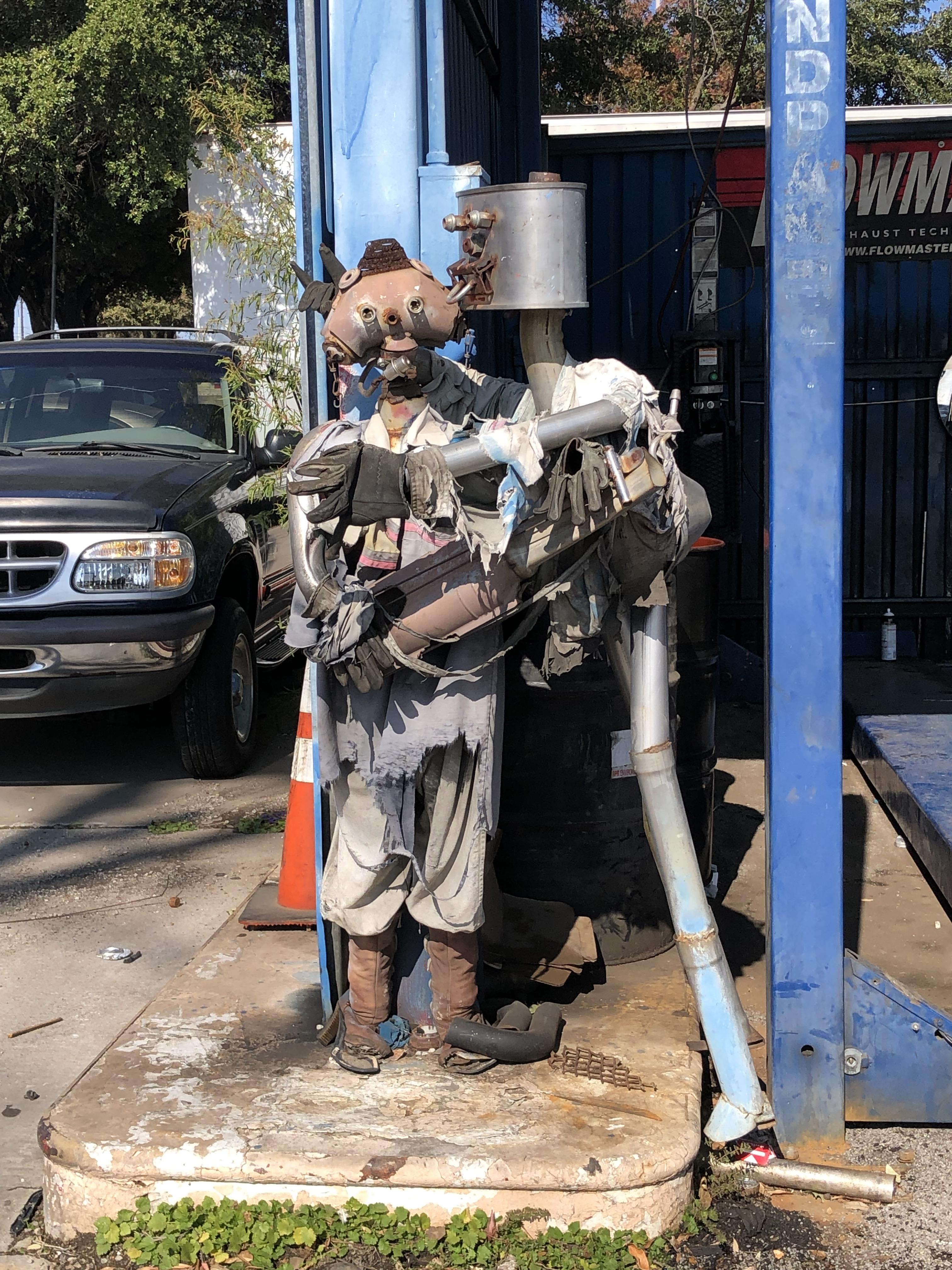 Car repair shop mannequin at NW Highway & Marsh r/Dallas