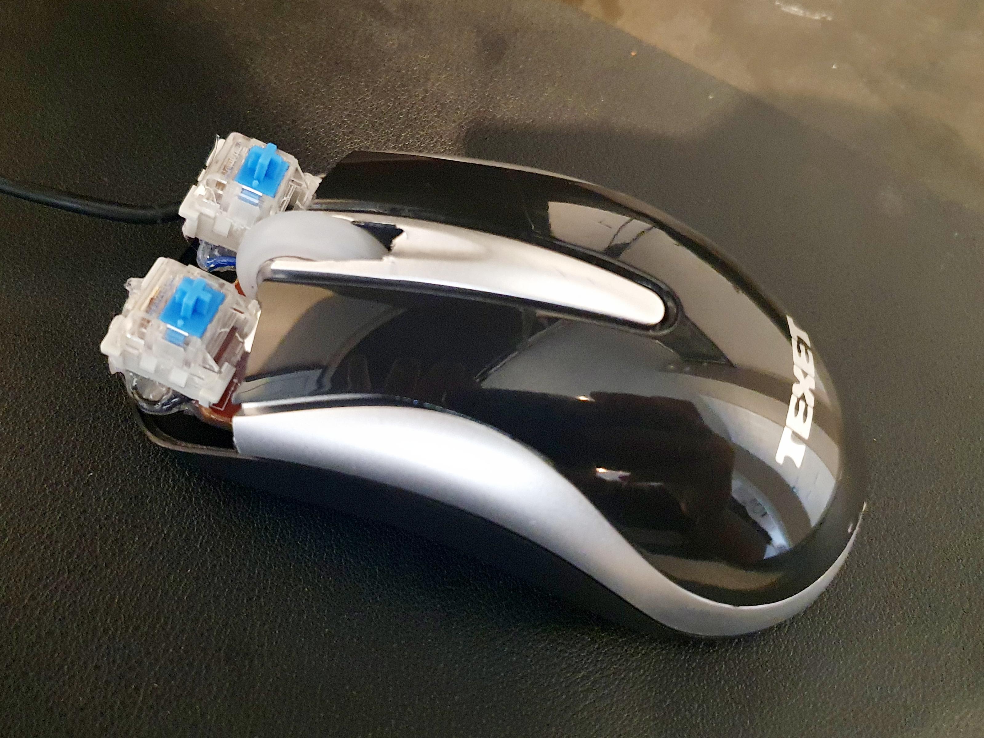 Added some mechanical switches to my mouse following from another