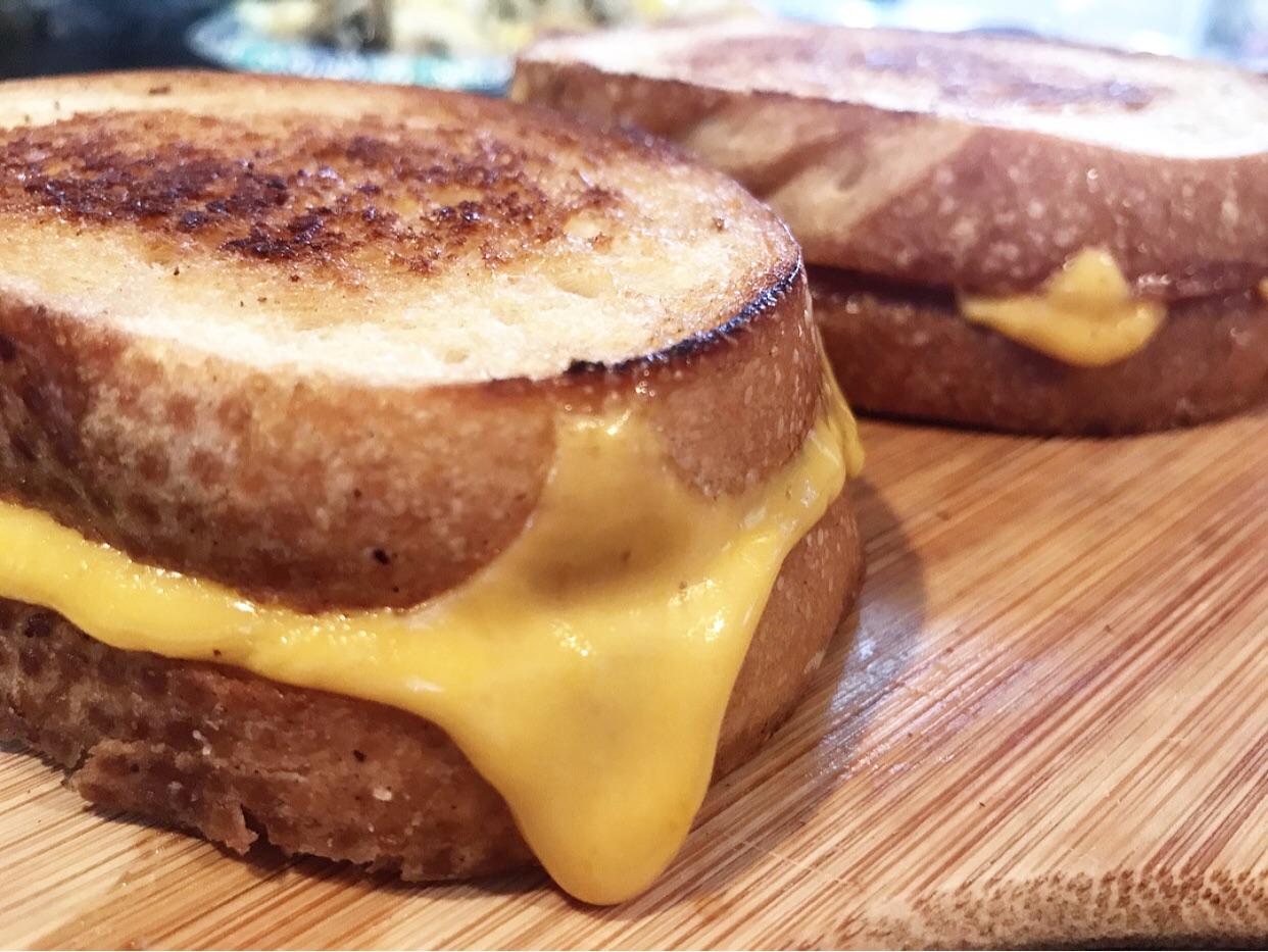 Mild cheddar on Sourdough bread. Grilled Cheese Chirps