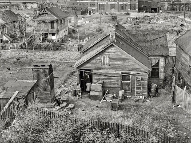 Houses along the railroad tracks. Omaha, Nebraska. Photo by John Vachon