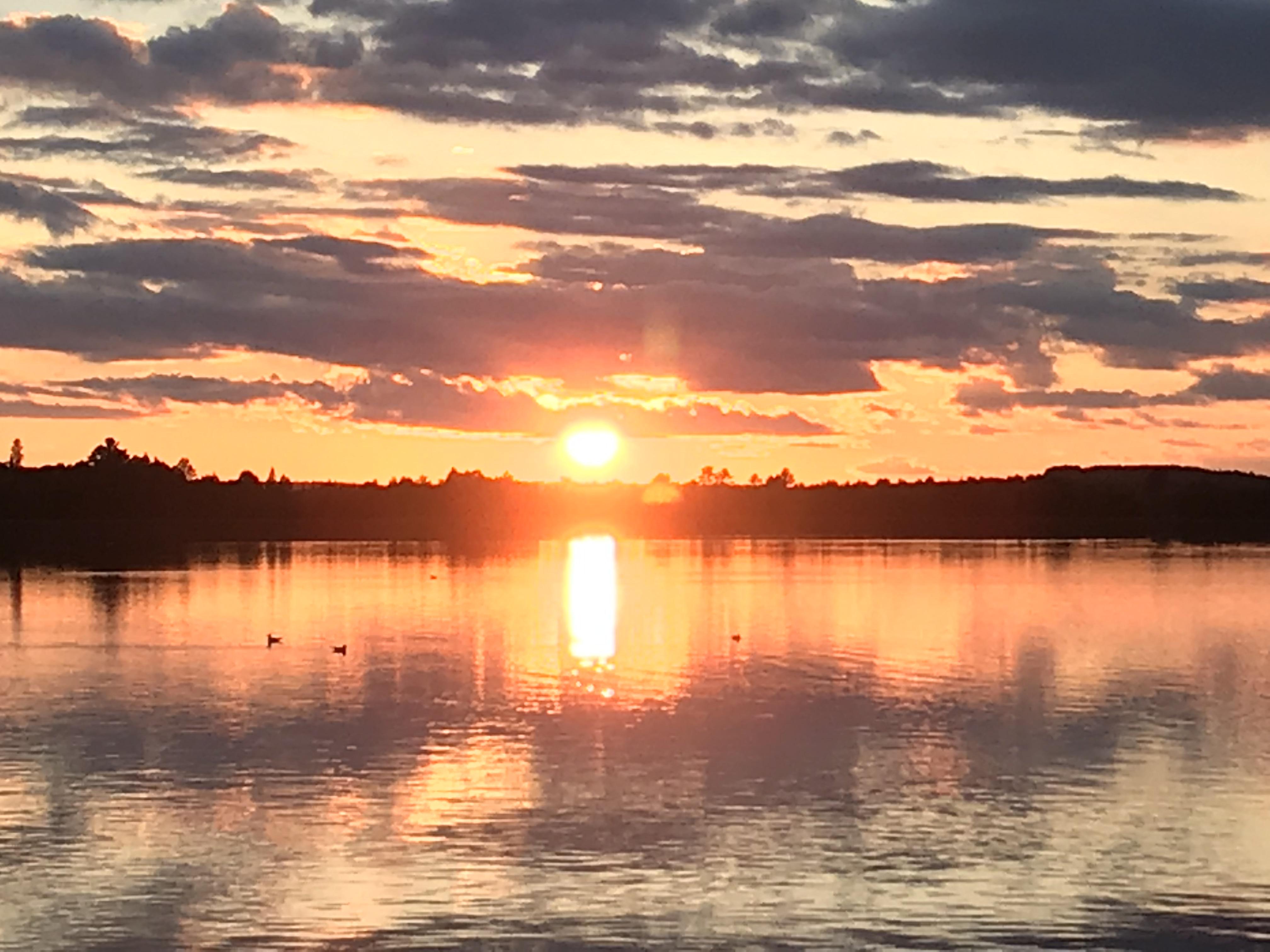 Sun set over lake I took while camping (Hoyt lake, MN) r/camping