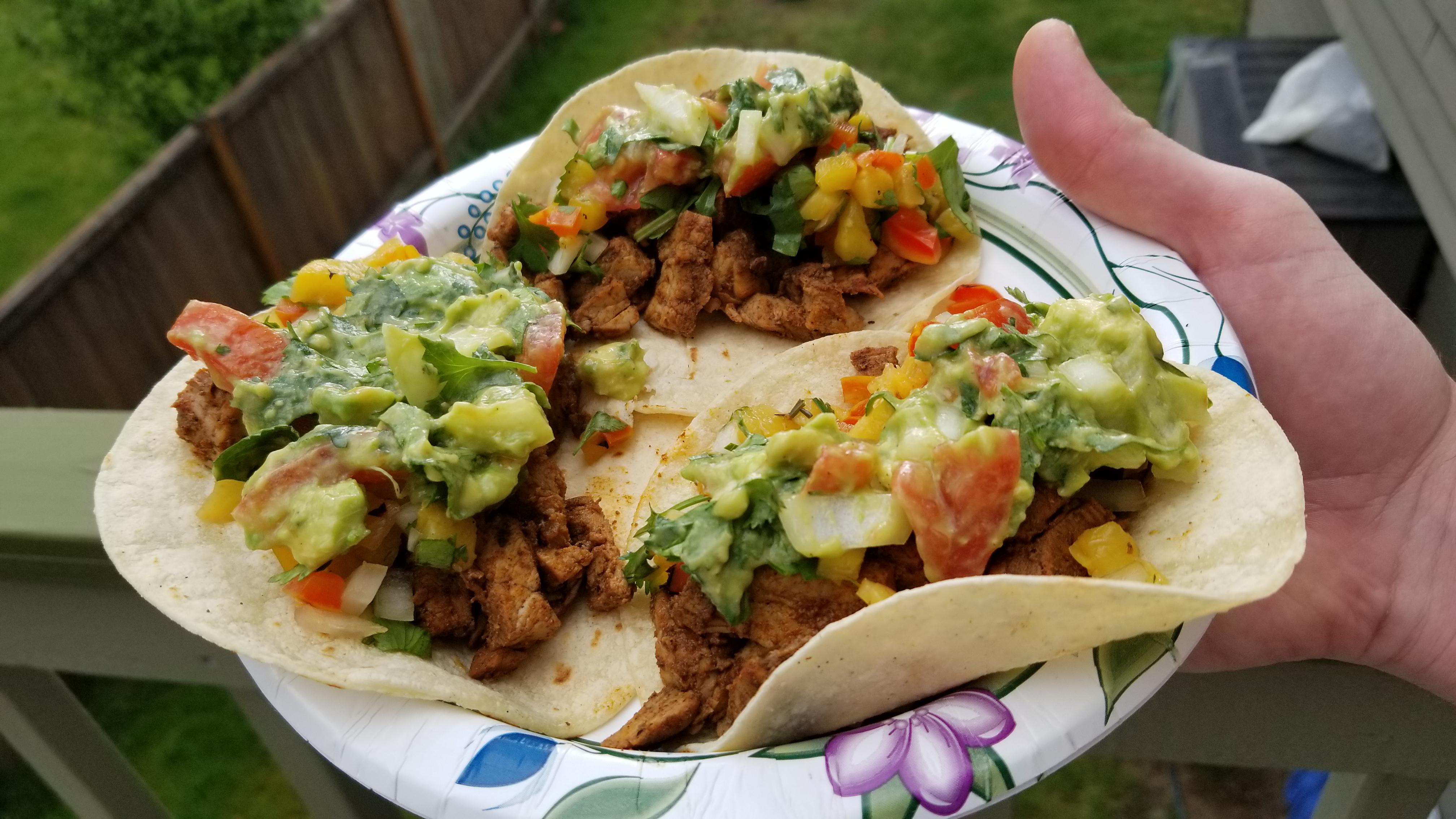 Homemade tacos al pastor with pineapple salsa and rough guac. r/tacos