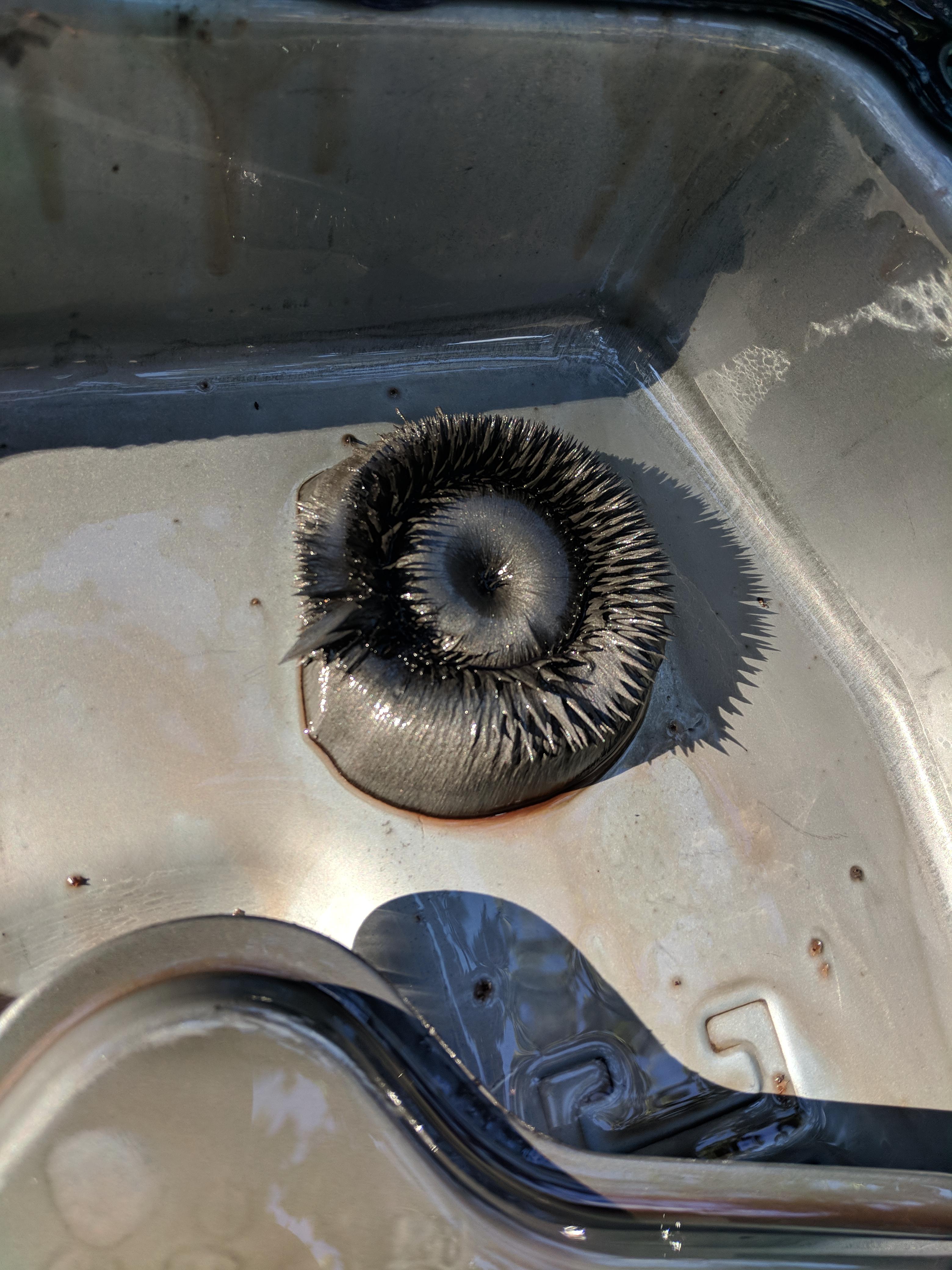 Why does the sludge form this shape, and what does this mean? 99