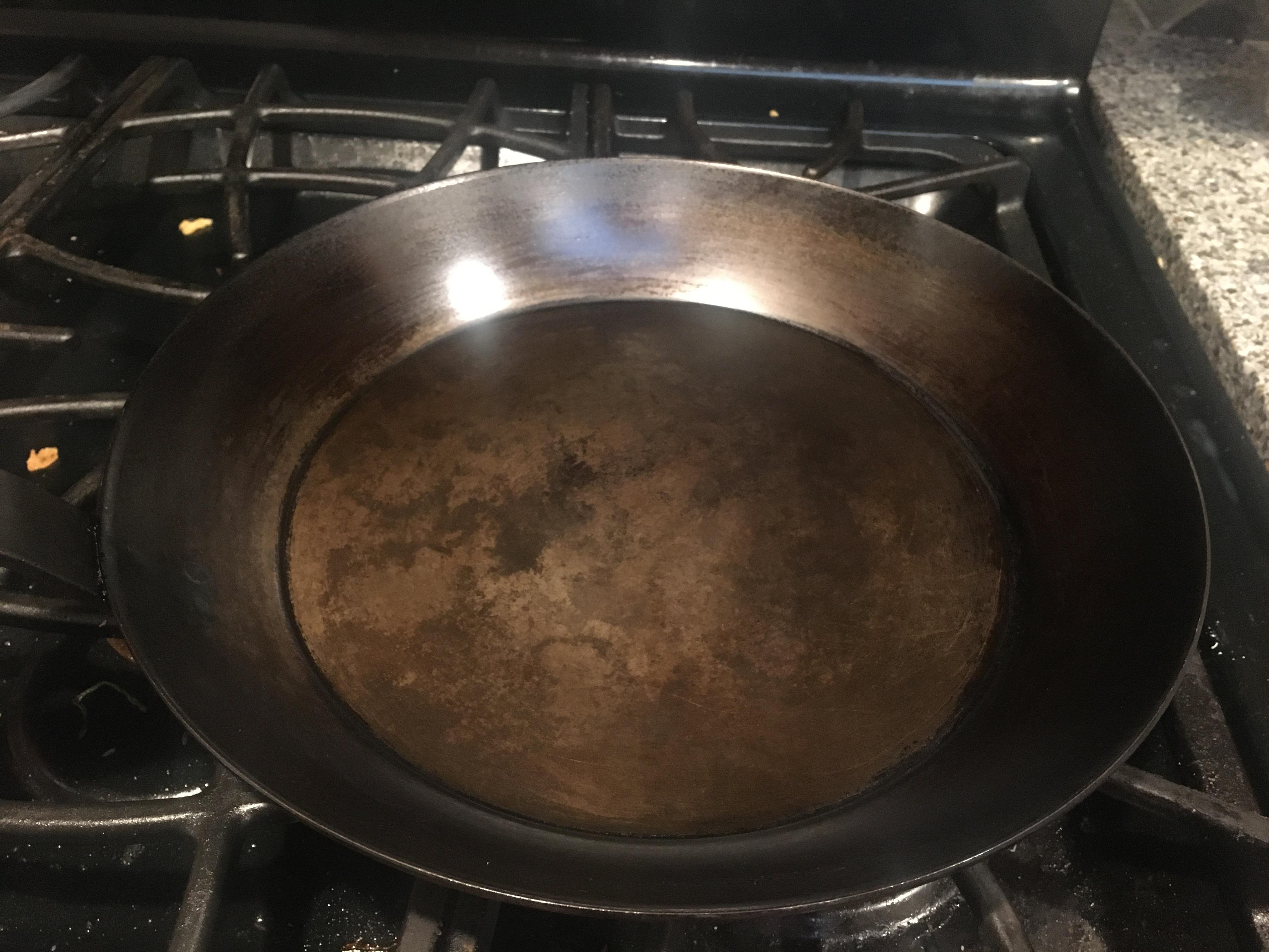 Believe it or not, this is a well seasoned pan. It will do fried eggs