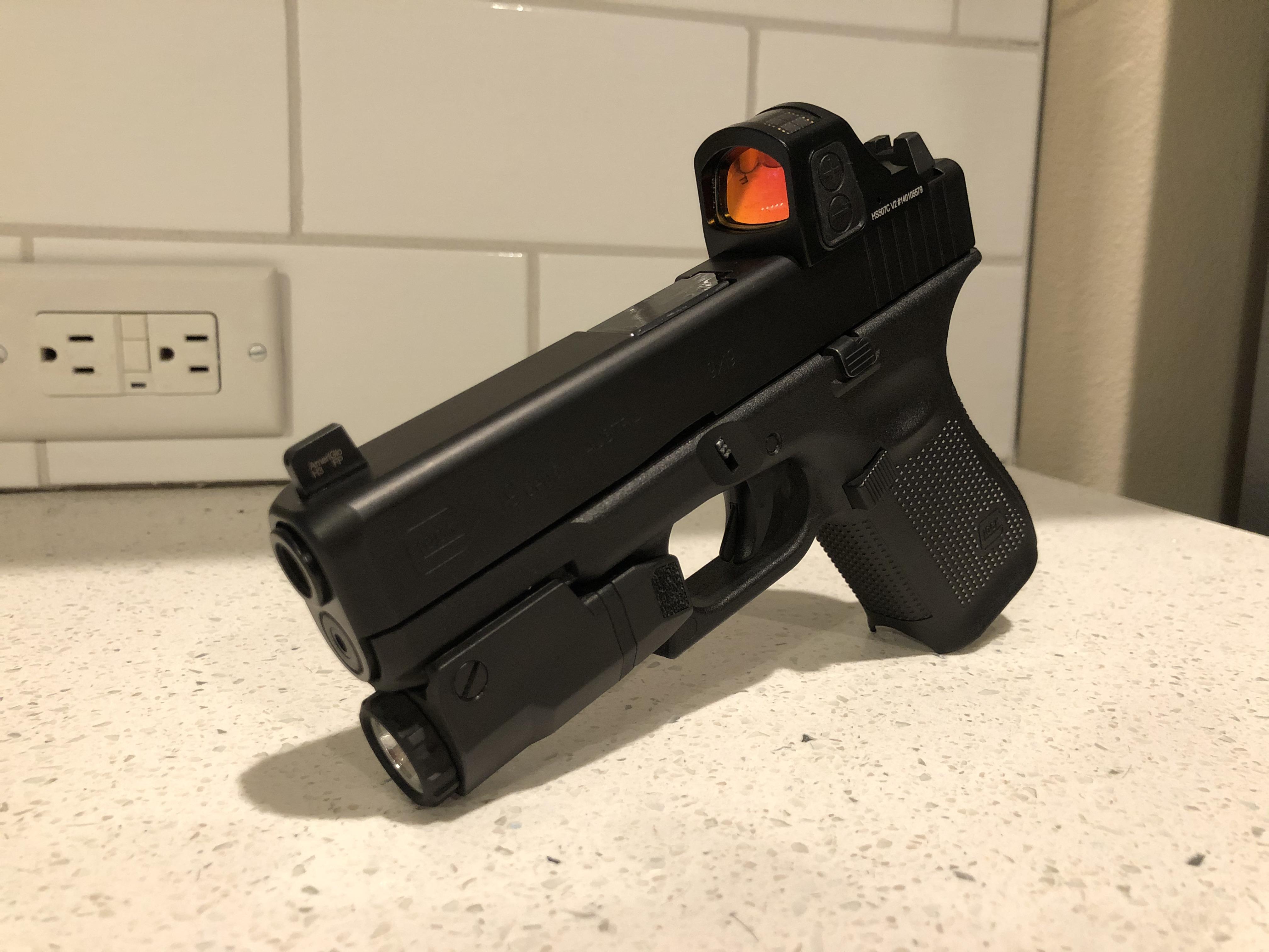 Glock 19 with a Holosun 507c. Slide cut by Battlewerx. r/Glock19