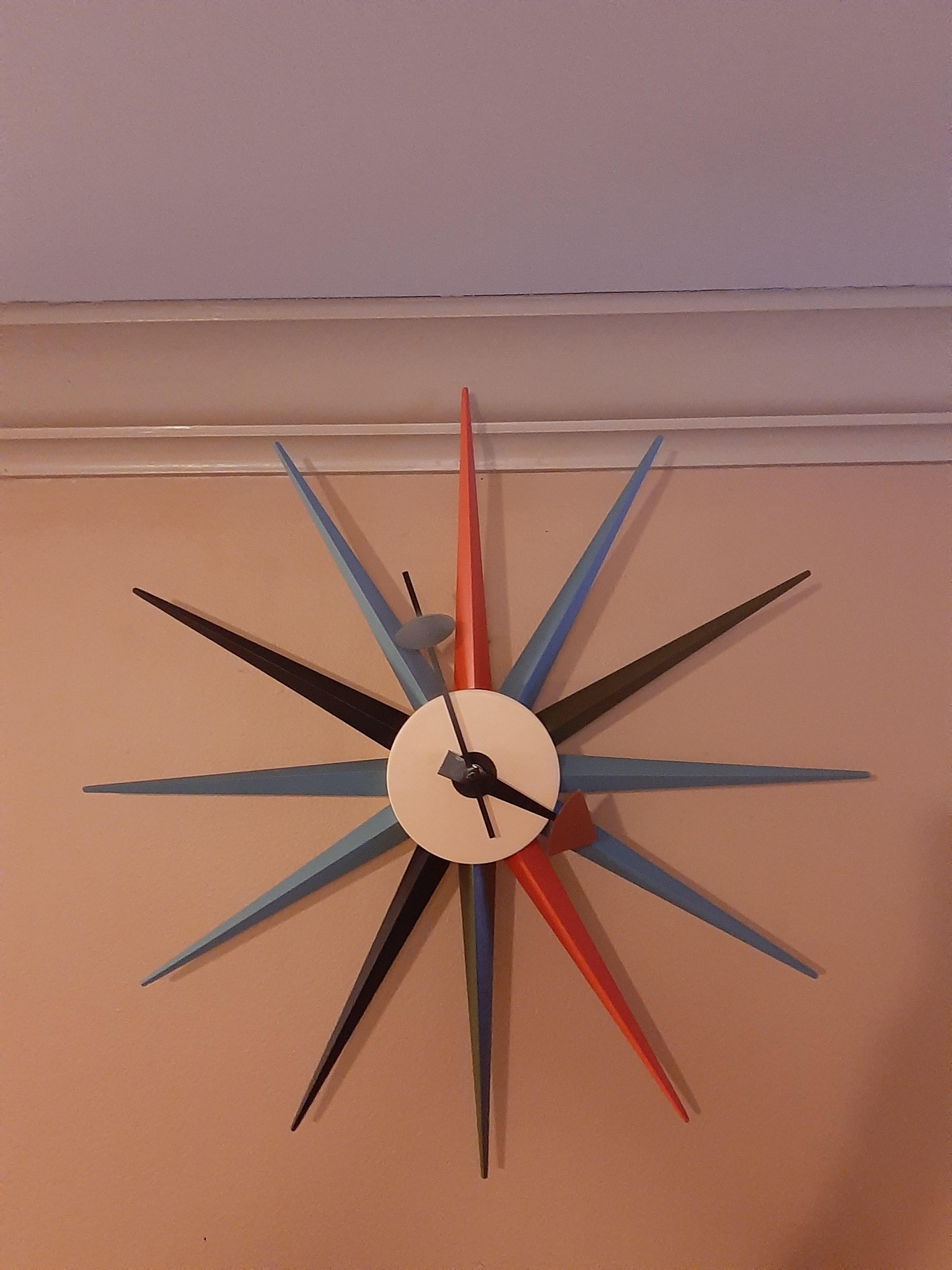 It is a replica. But I love this Nelson style starburst clock. r/Mid