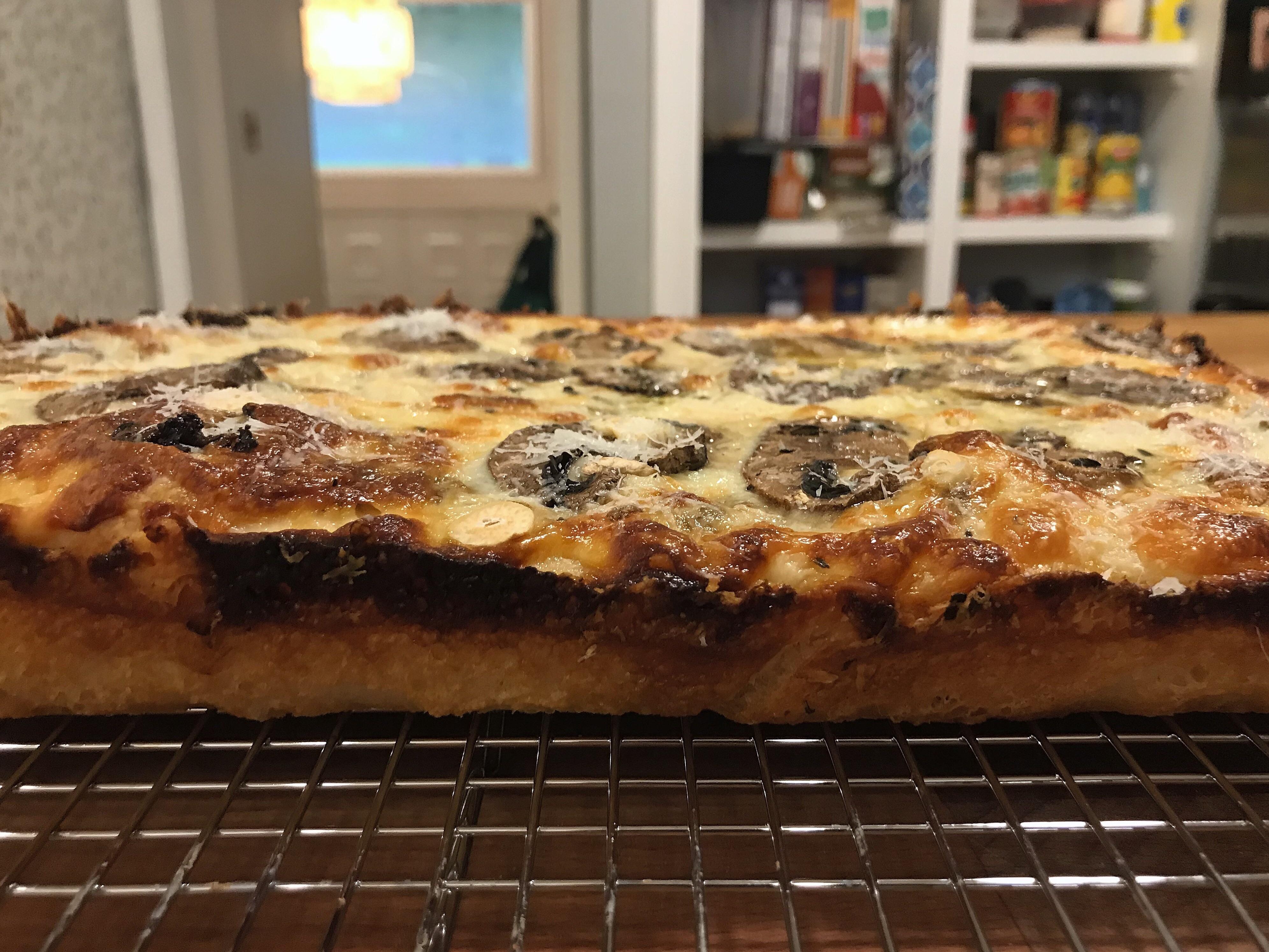 Kenji’s mushroom duxelles pizza with Detroitstyle dough and cheese. r/Pizza