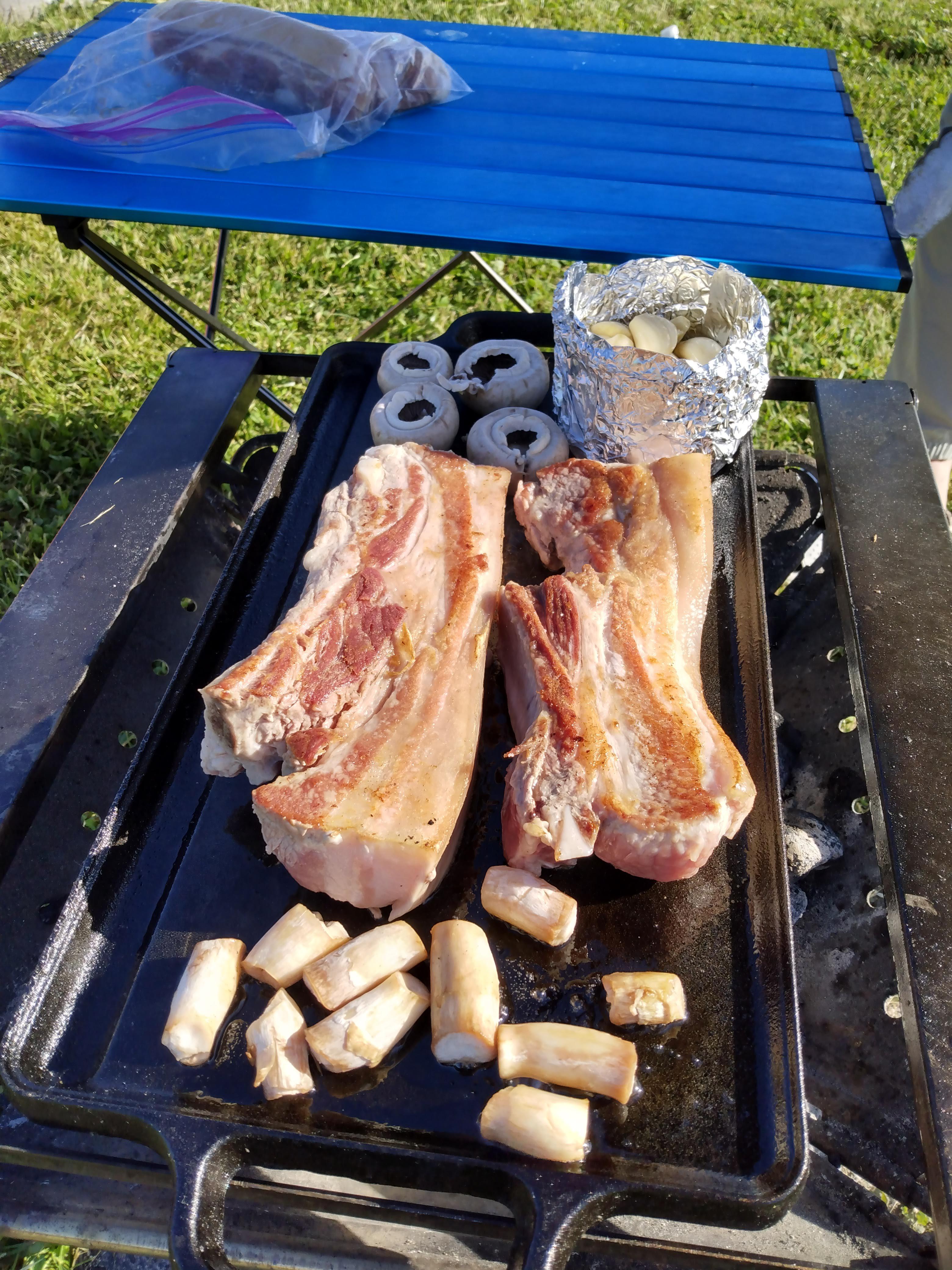pork belly on a snow peak charcoal grill. i love camping and i love