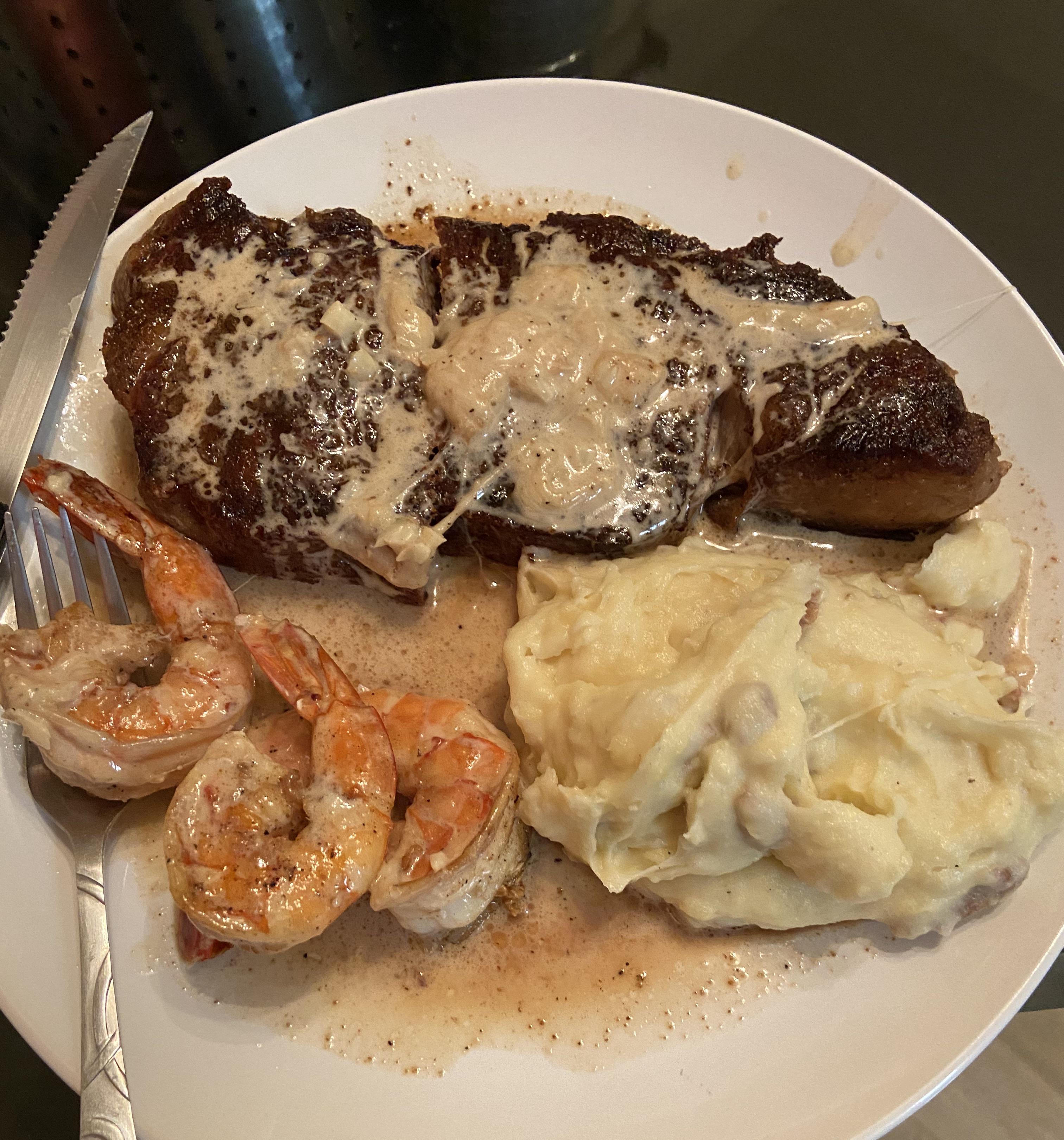Dinner... New York steak colossal shrimp and mash potatoes. Home made