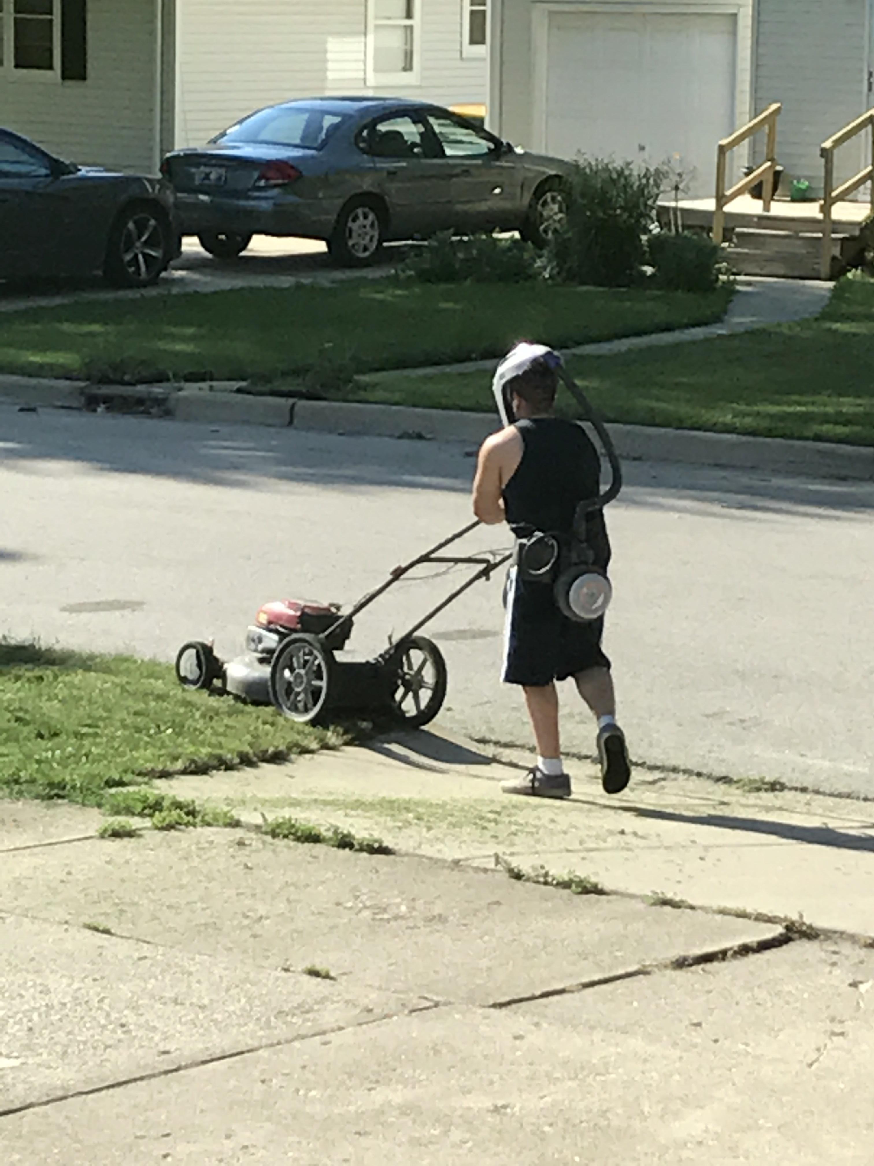 What is this thing my neighbor is wearing while mowing the lawn