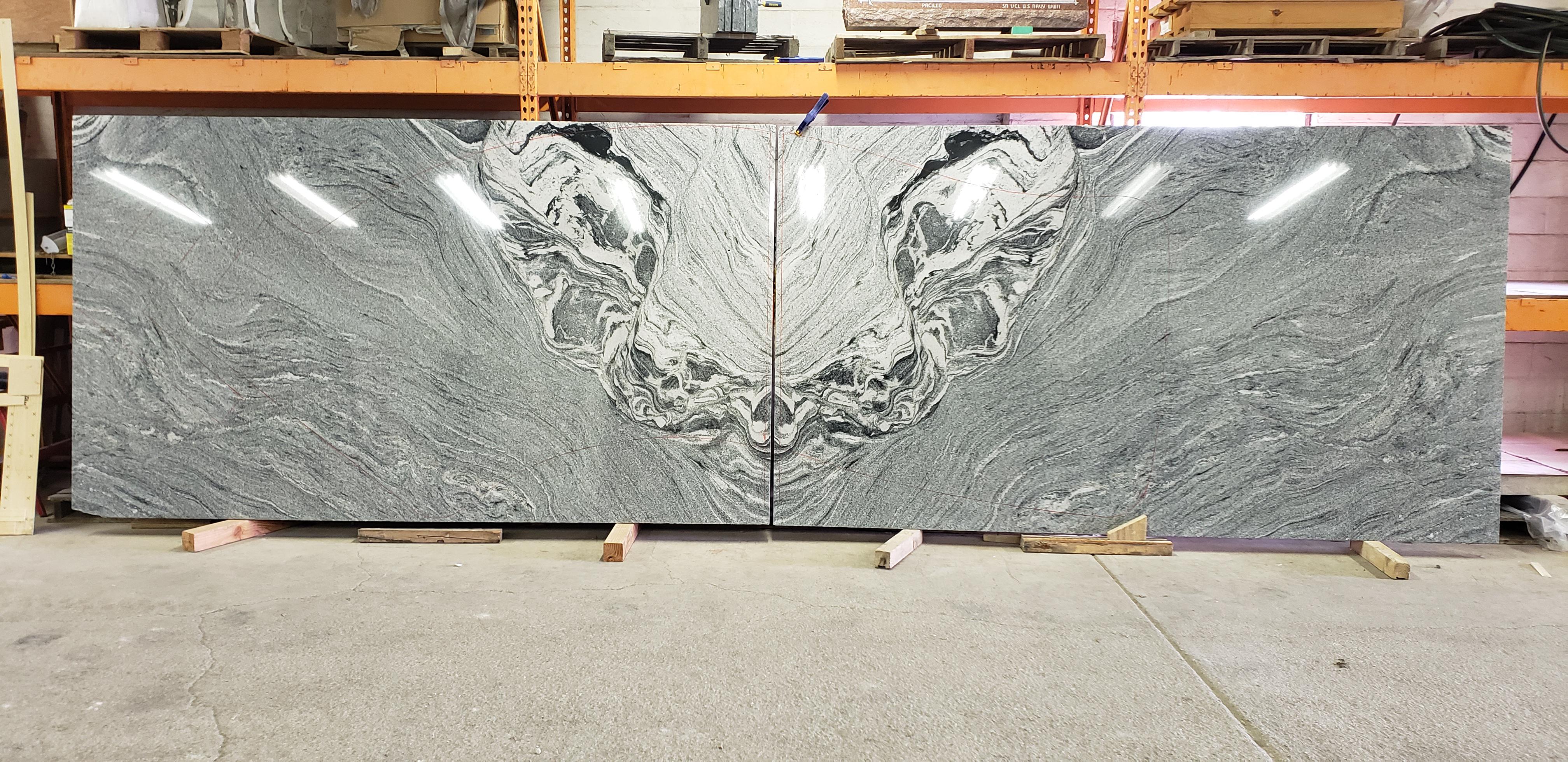 These two "book matched" slabs of granite r/pics