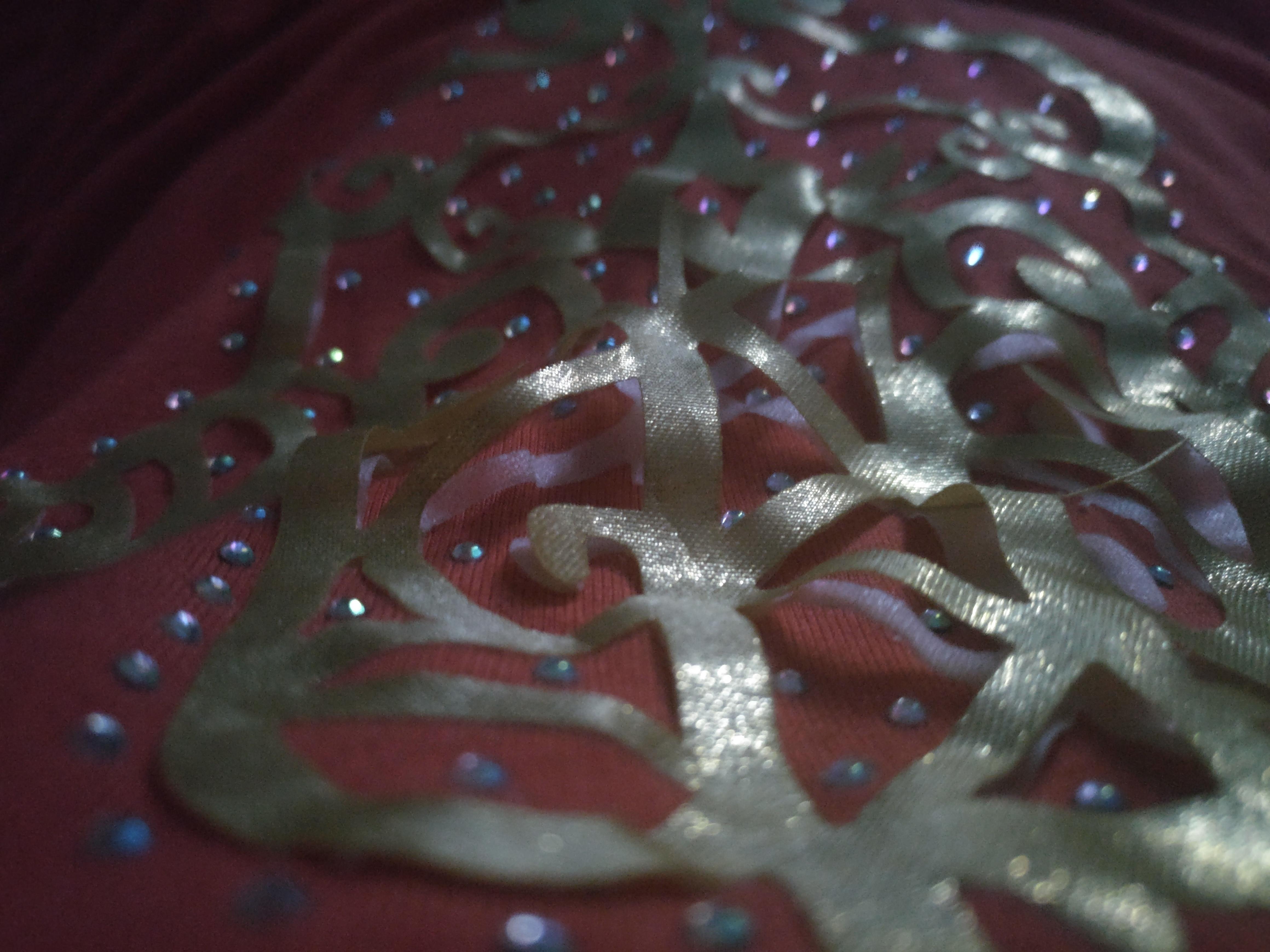 Shirt design peeling off. Has two layers and one is close to falling