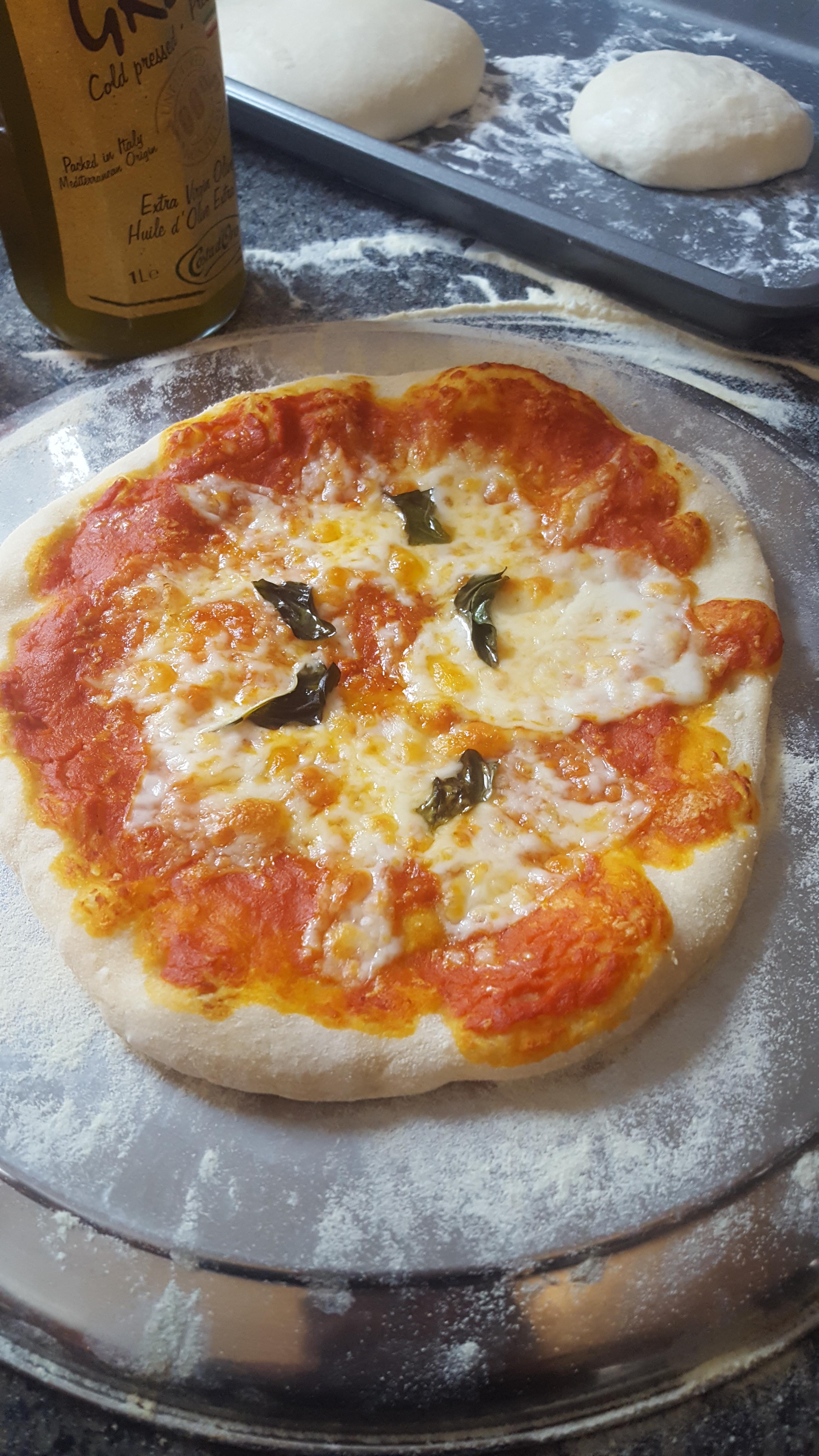 My first pizza. Any tip how to get the burn marks on the crust? I used
