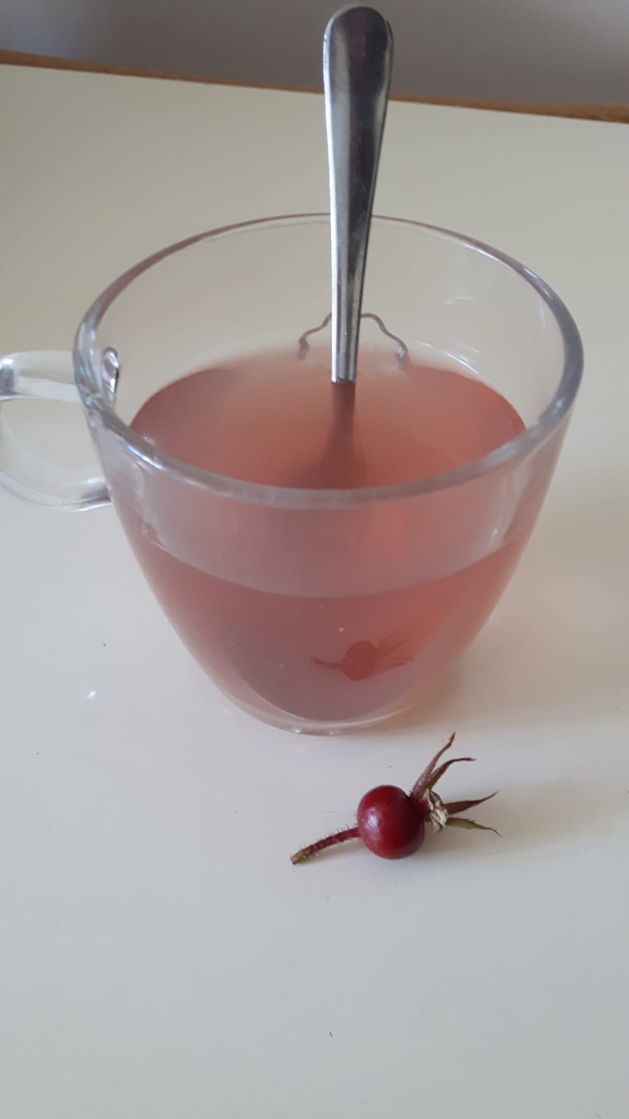 Got inspired by the game to make rose hip tea from rose from real