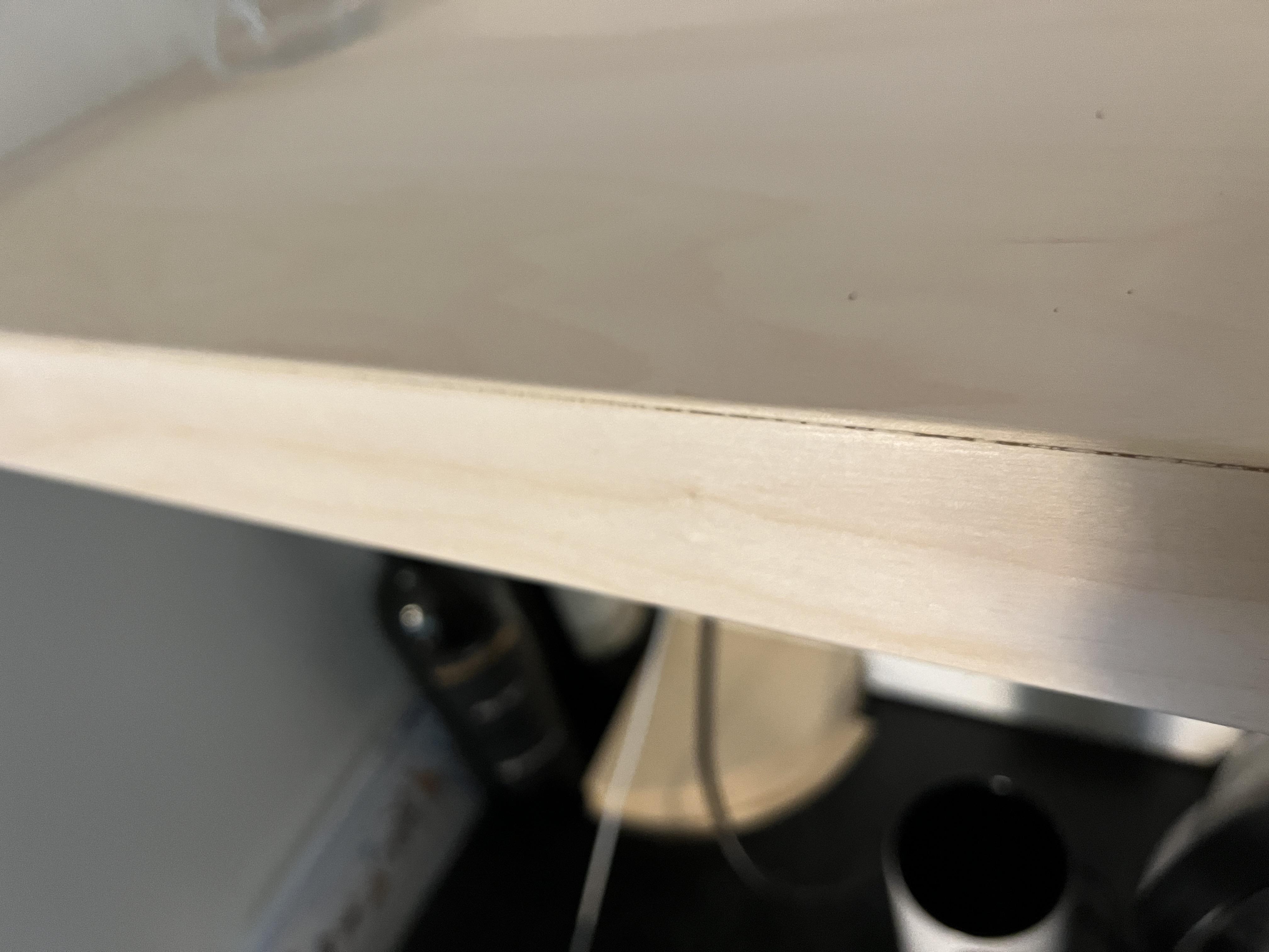 Birch plywood floating shelf. Slight gap in mitered edge. Any advice on