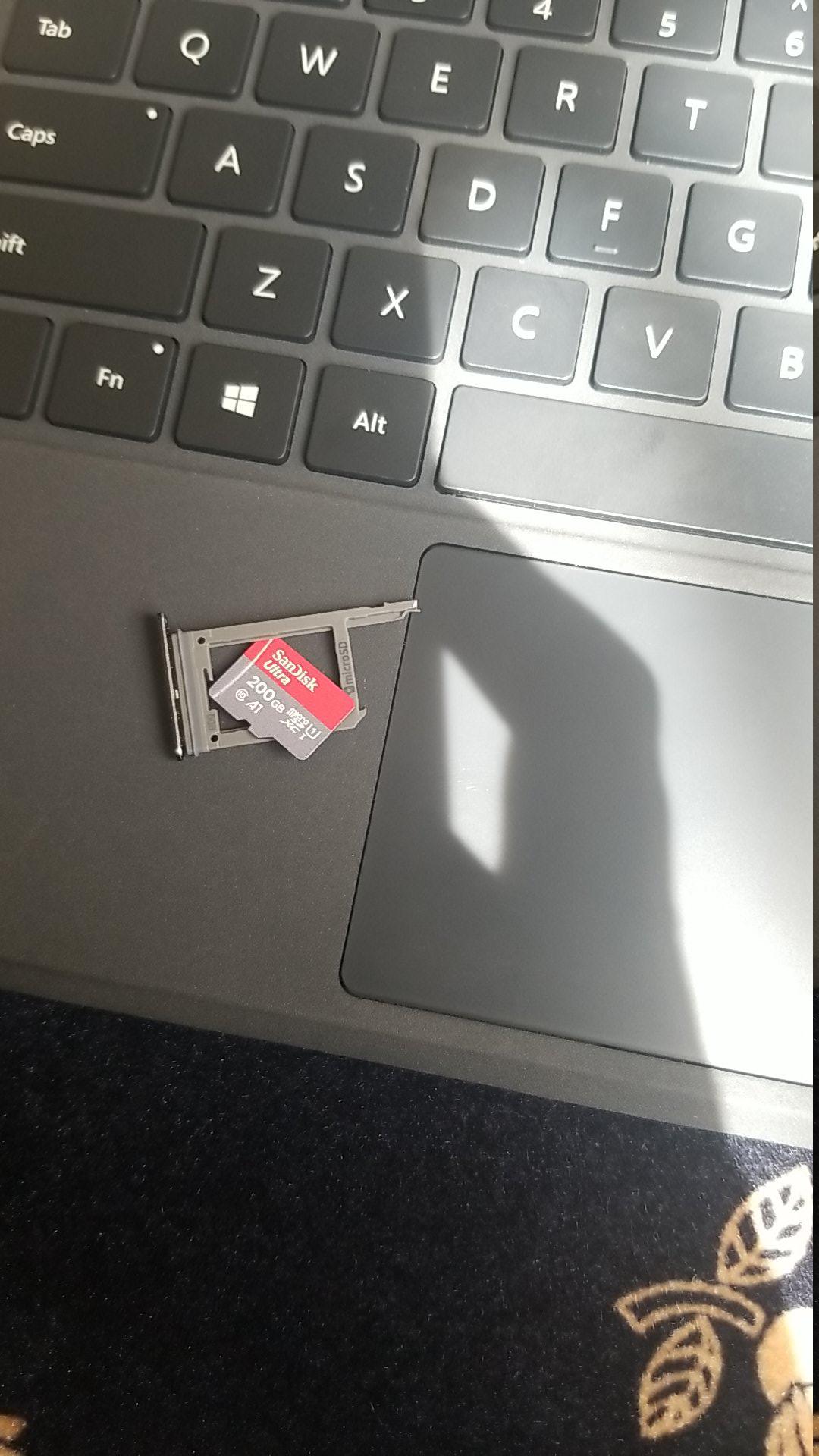 The sim tray of my phone broke, and the sim card is stuck in my phone