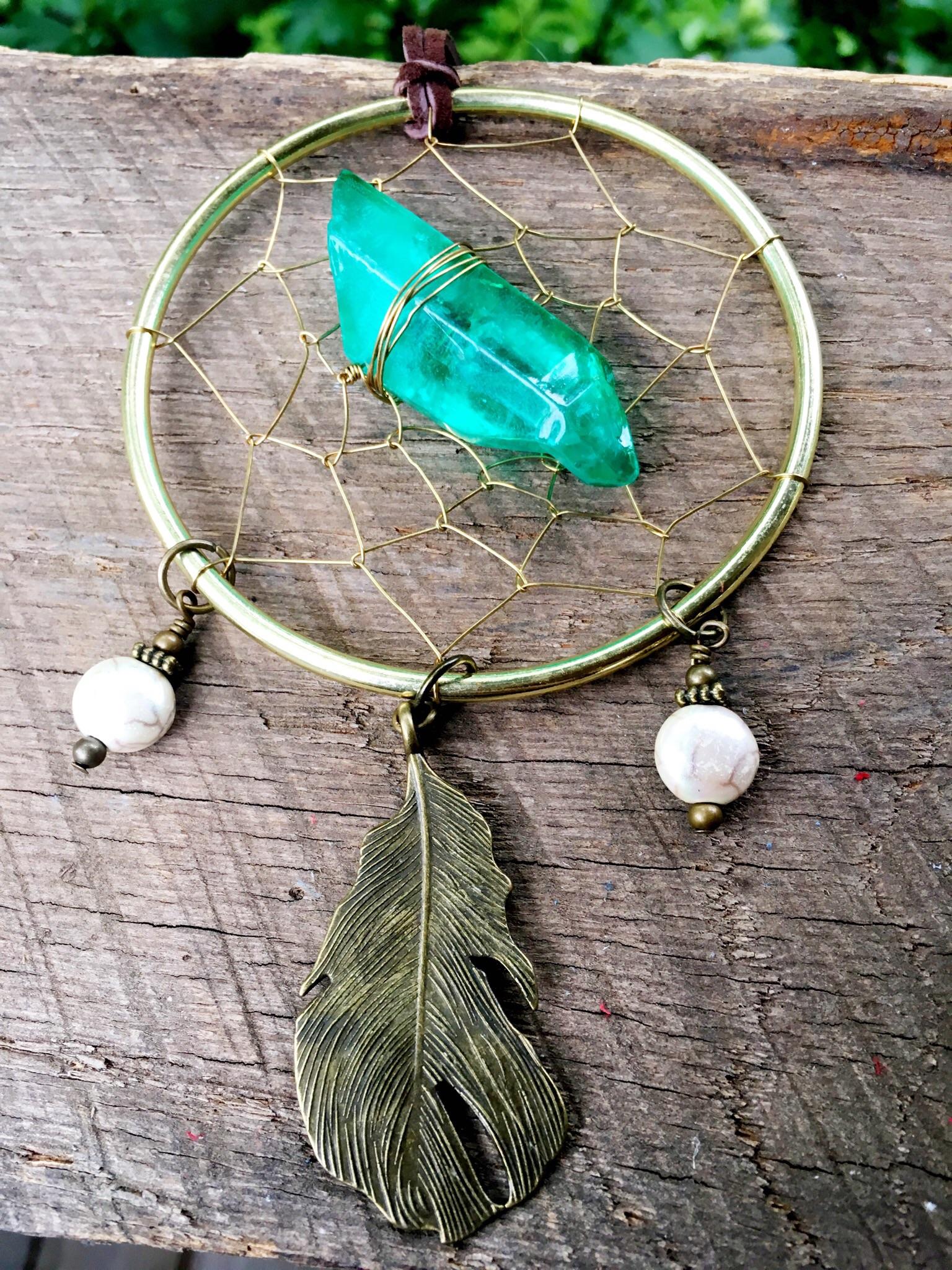 Dreams unwind, love’s a state of mind. Dream catcher necklace I made