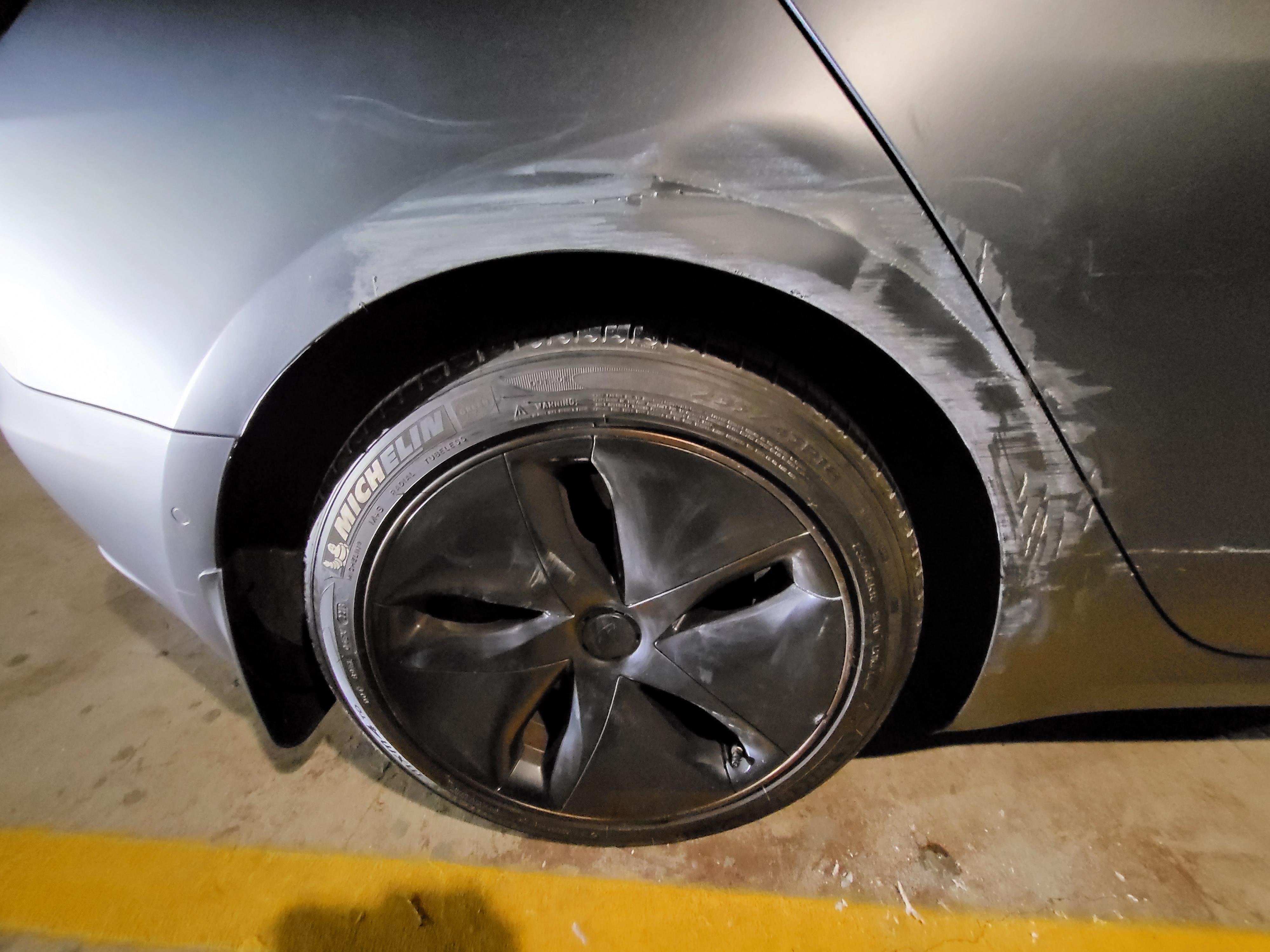Quarter panel dent r/TeslaModel3