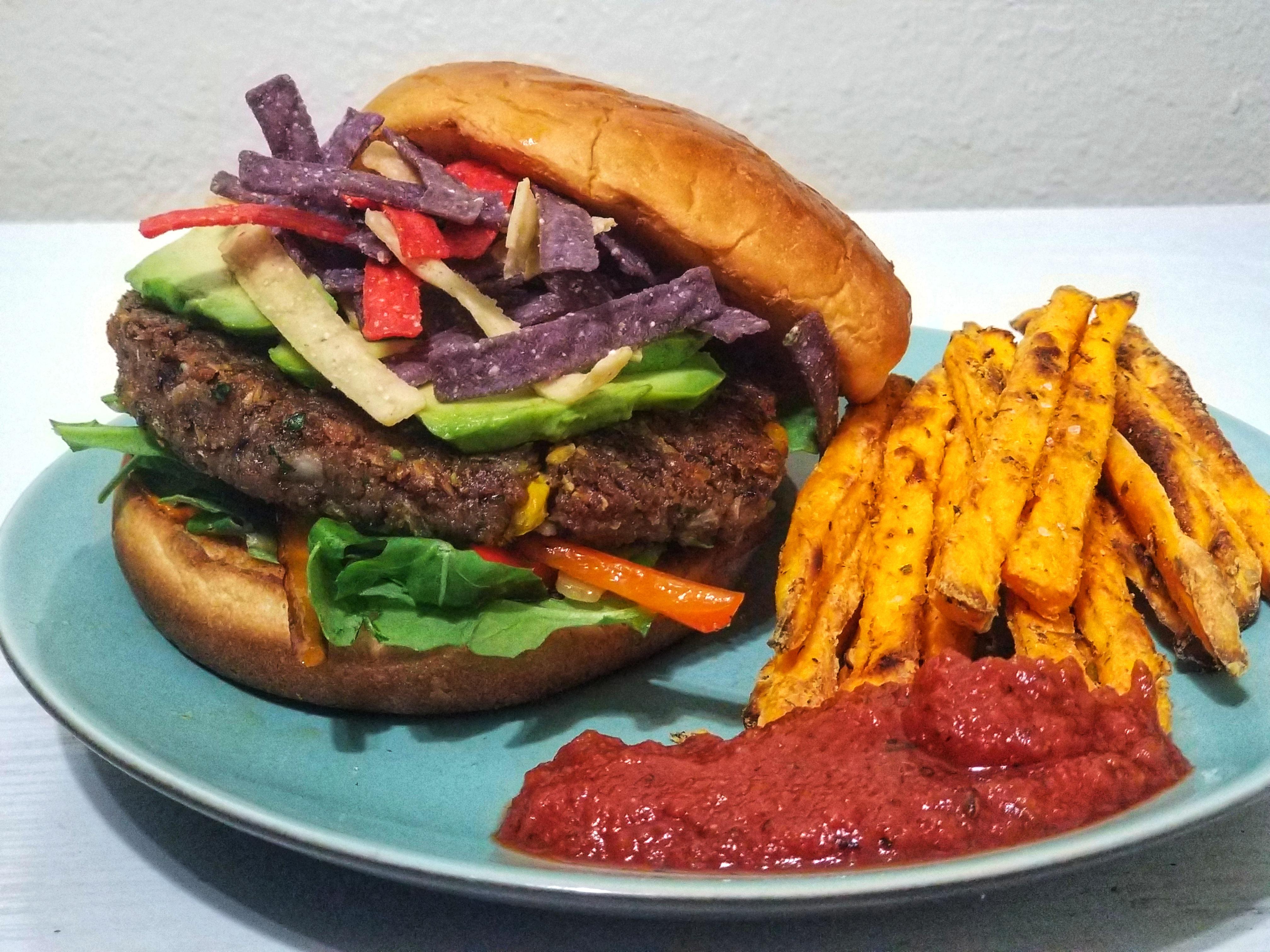 Homemade black bean burger, sweet potato fries and fire roasted spicy ketchup last night for