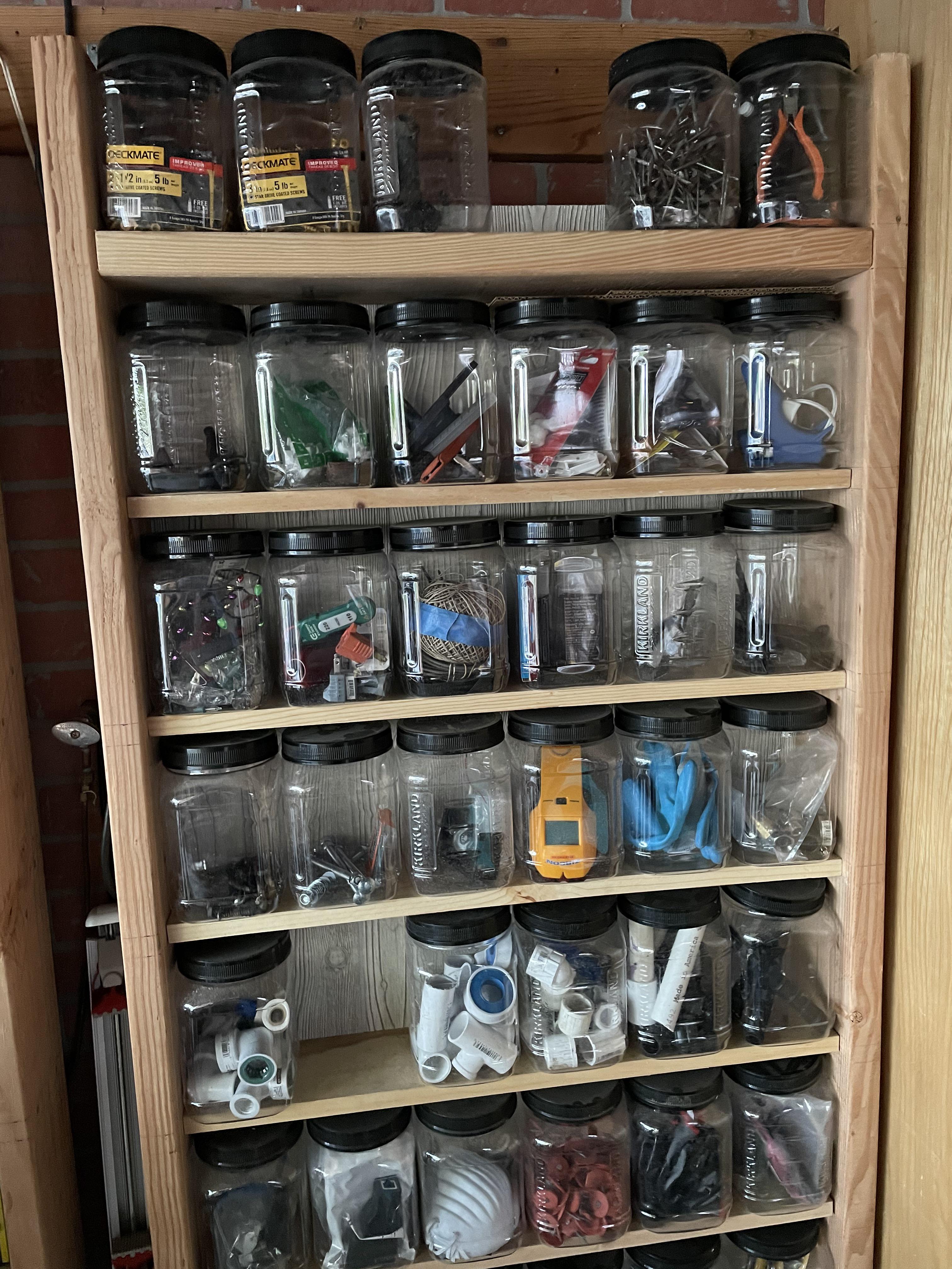 Using Costco nut containers for garage storage. Custom made wooden