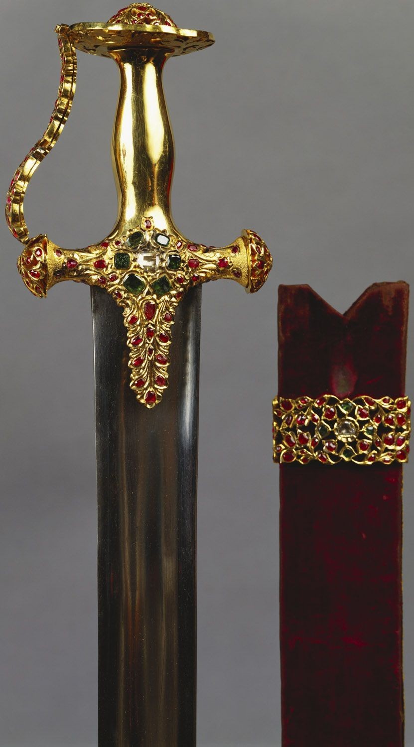 Bedazzled straight blade with a tulwar hilt, a gift to the prince of