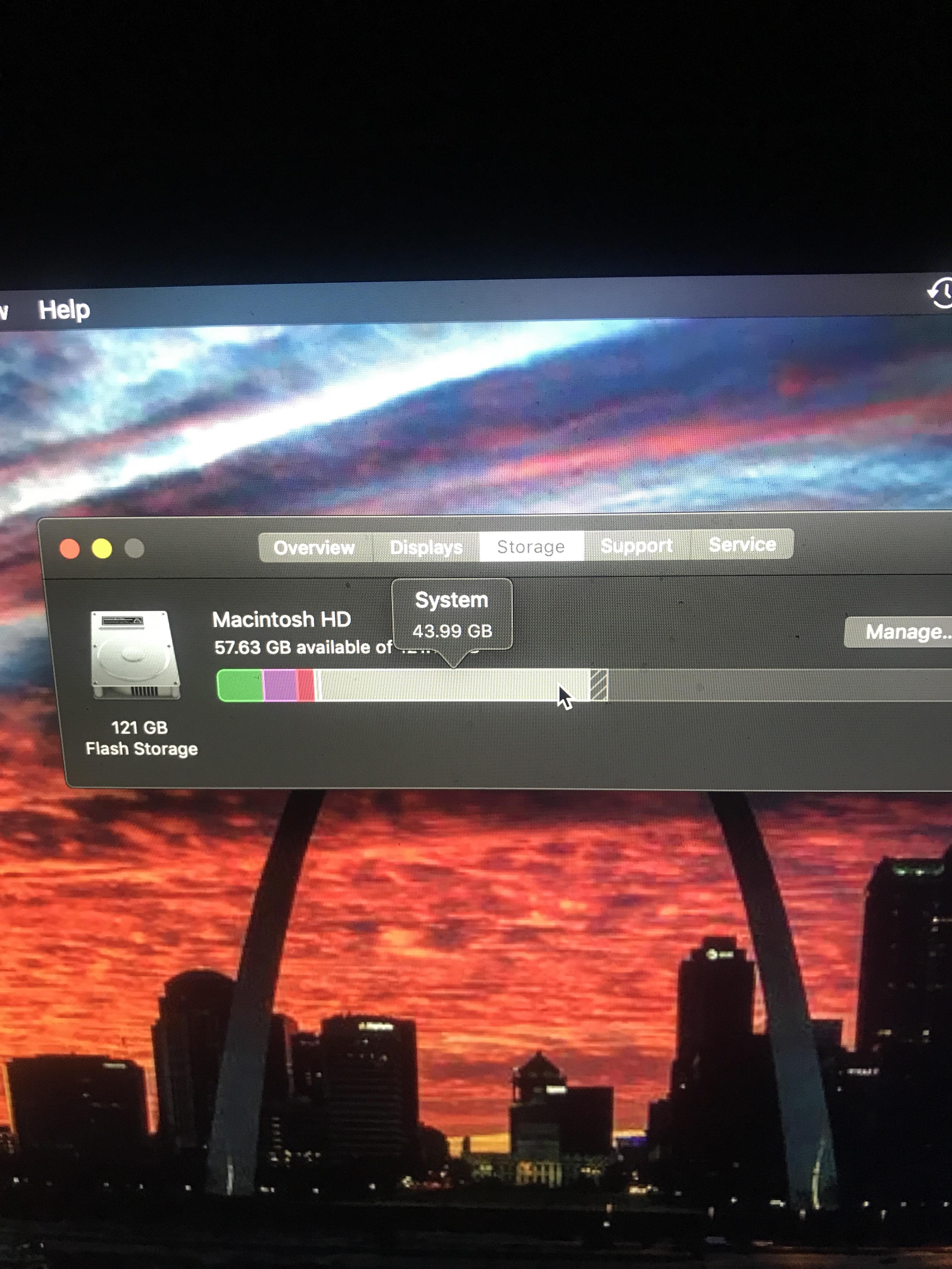 Why are the “System” files taking up so much space and how can I delete
