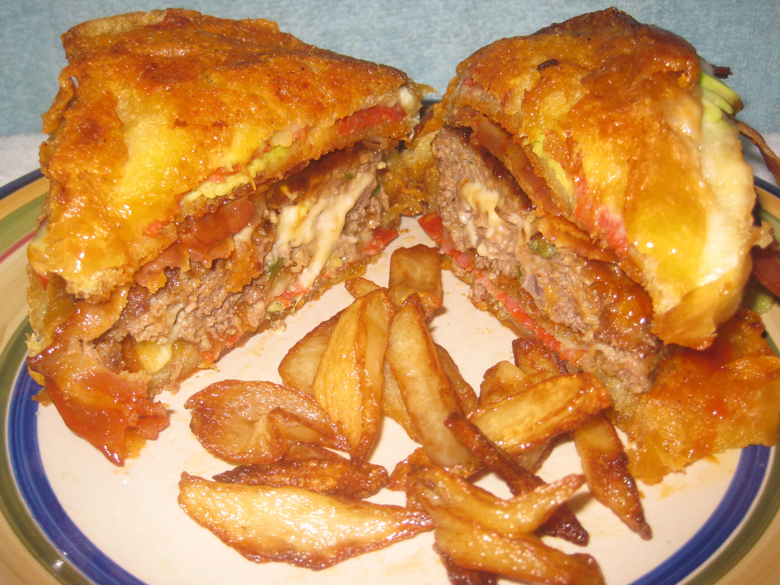 My take on that Vatican burger. Inside and out (cheddar out/smoked provolone in)grilled cheese