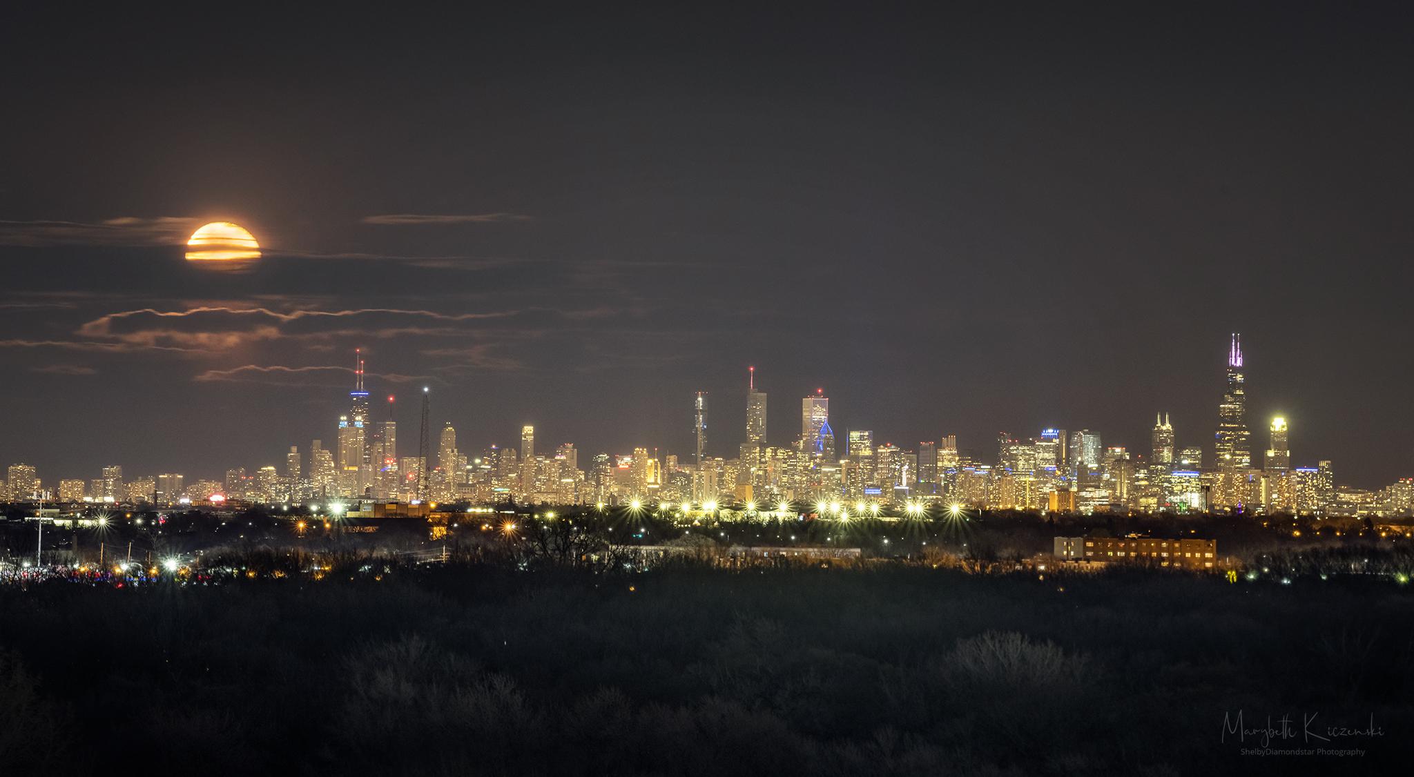 Telephoto shot of the moon rising over Chicago. Taken last week! r