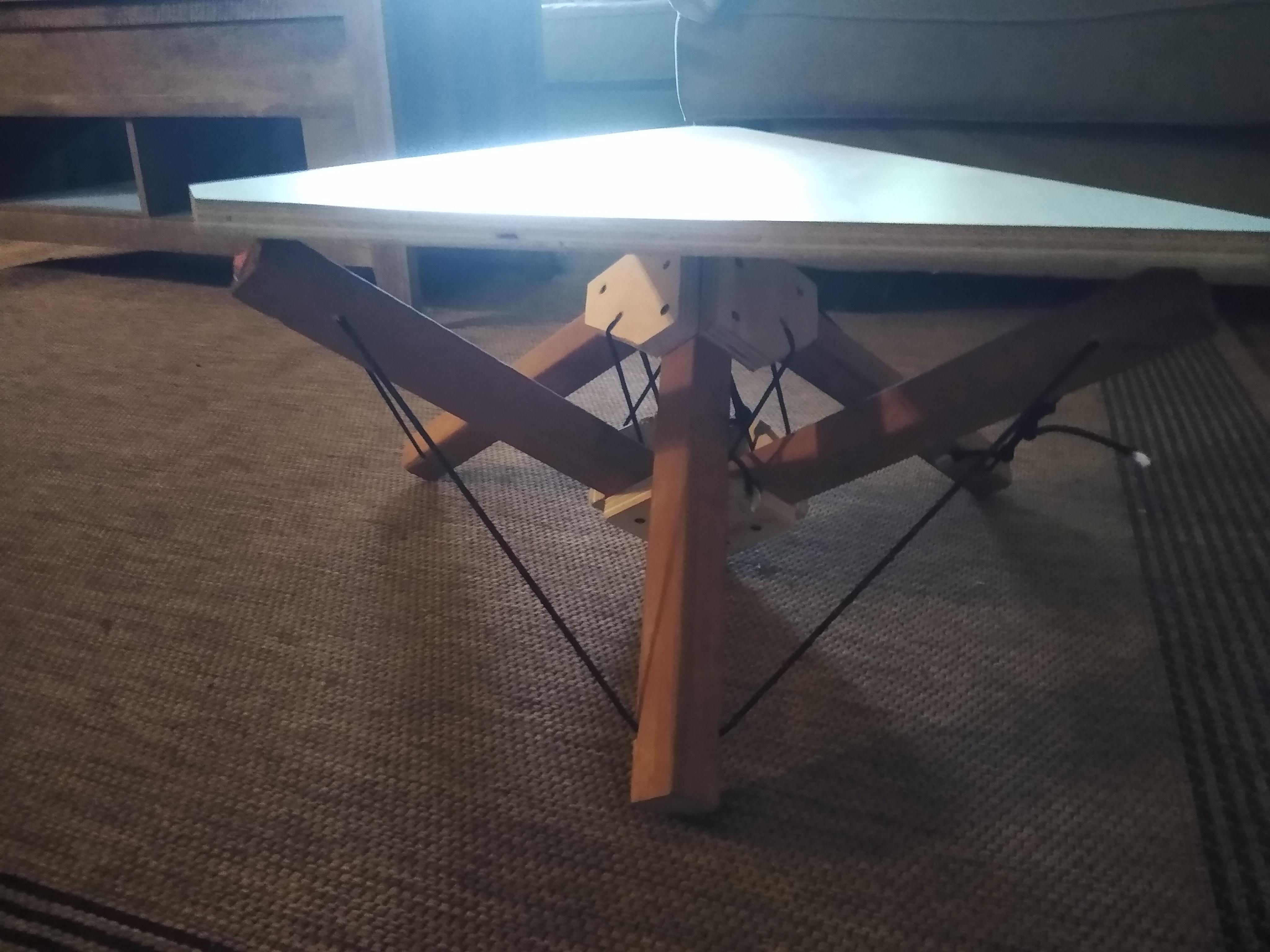 I made stable tensegrity table that I can stand on r/BeginnerWoodWorking