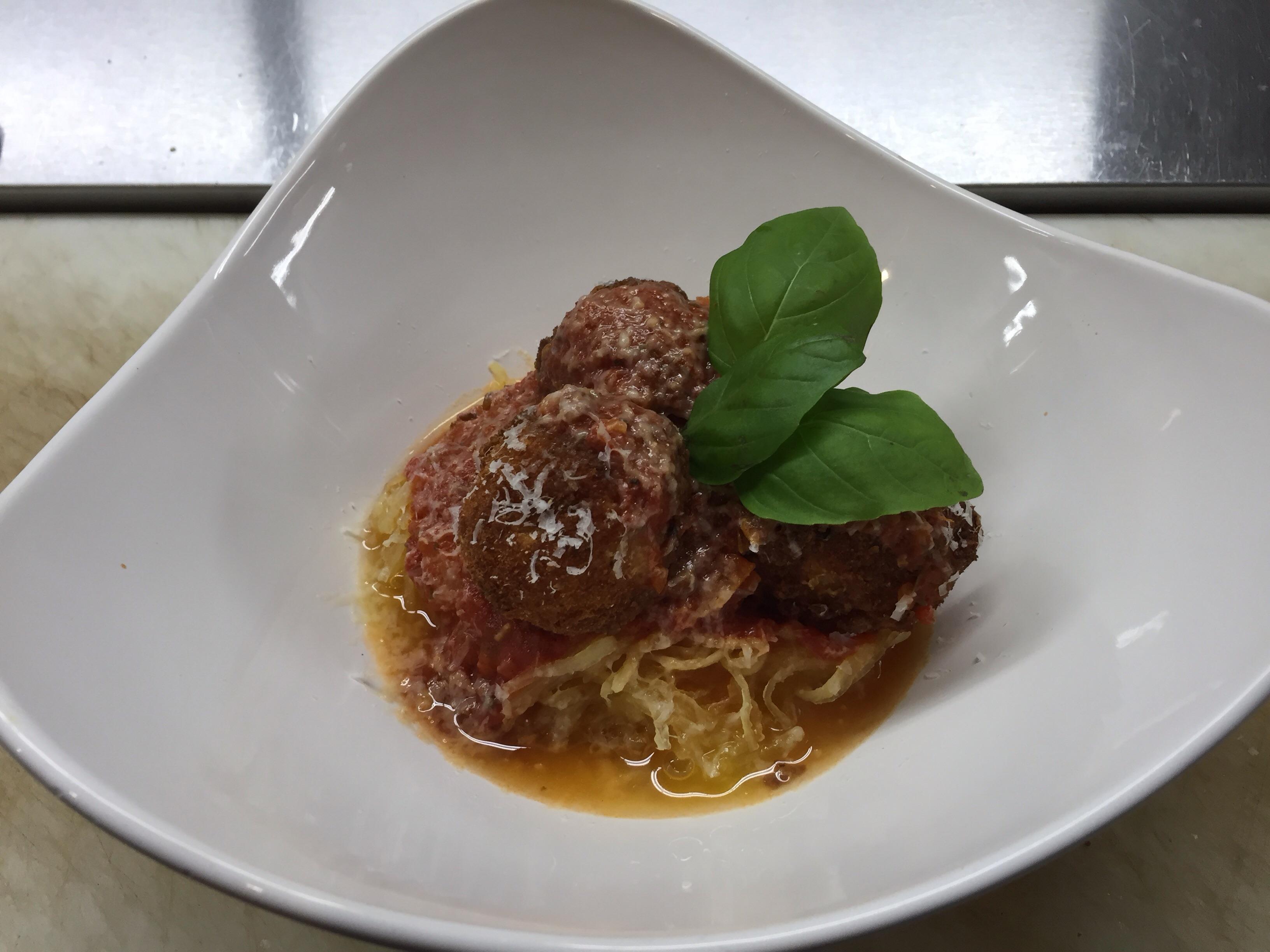 Roasted spaghetti squash with tomato sauce and arancini (fried risotto