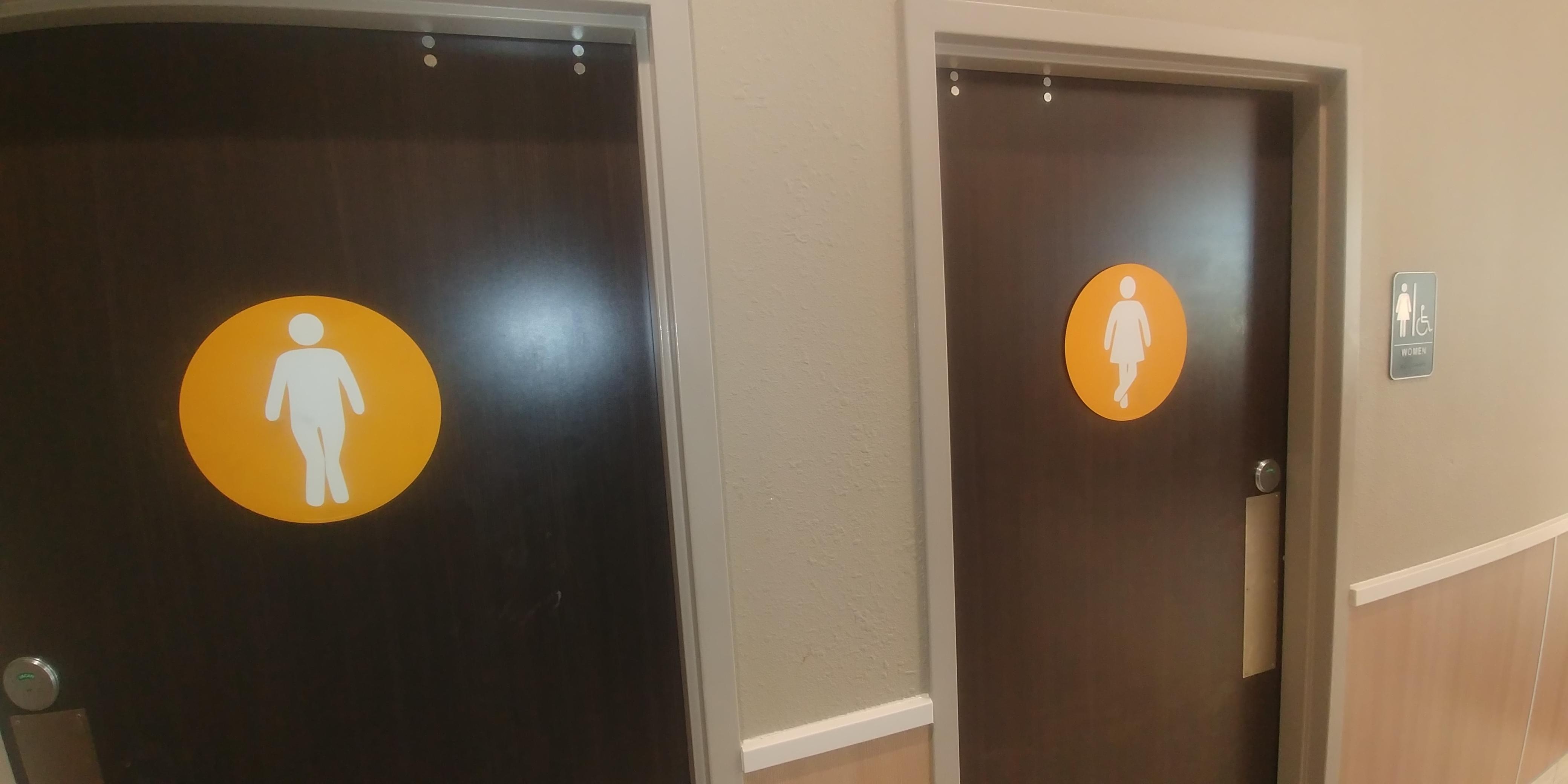 These restroom signs at Burger King that "need to go" themselves r