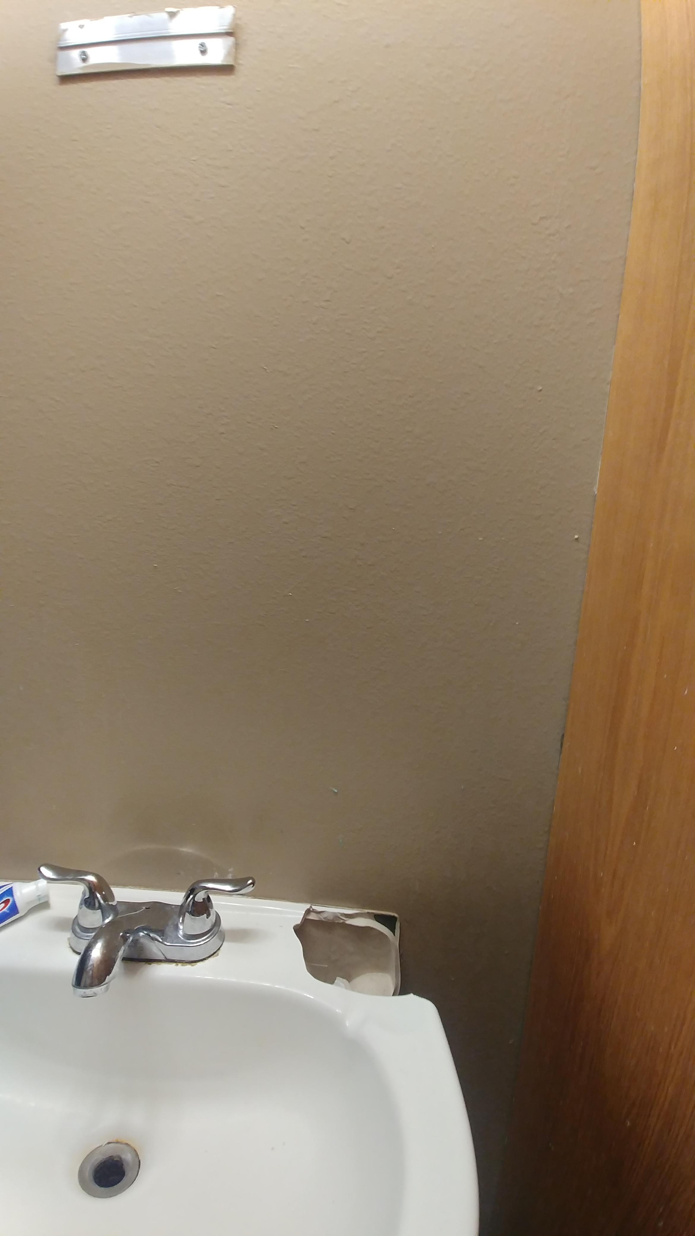 The glue came off my bathroom mirror, and it fell onto the sink below