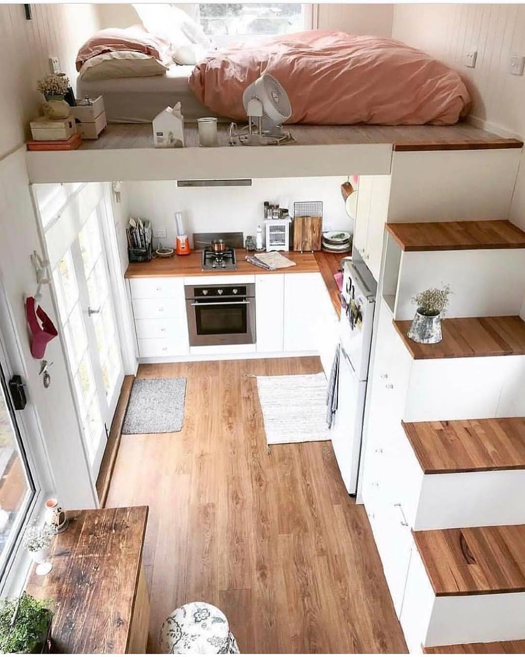 Tiny sleeping loft above a cozy minikitchen r/CozyPlaces