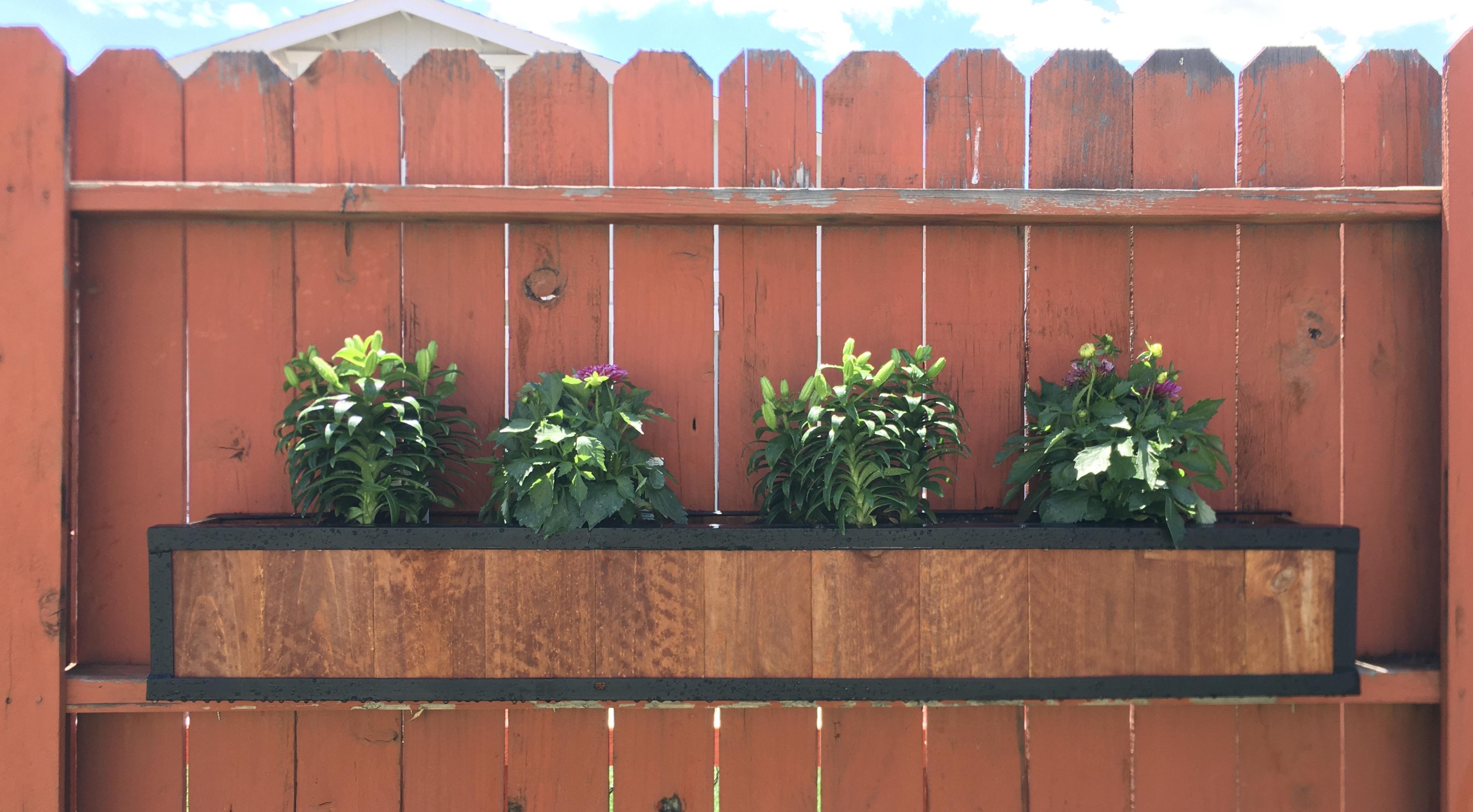 Made the wife a flower box for the fence. Simple.. but she finds it so