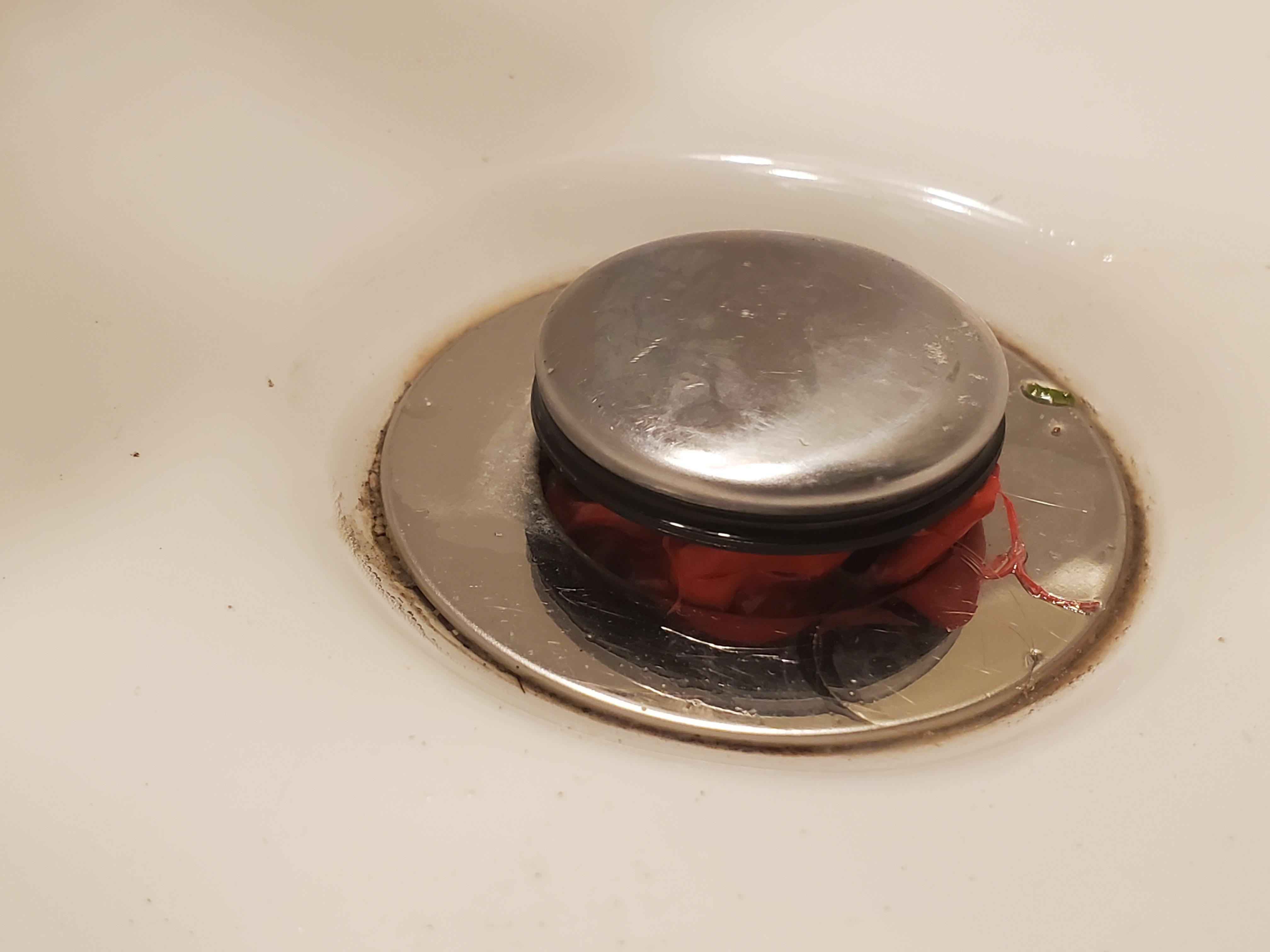 Regularly clean sink drain. Last time, out came red rubber/latex