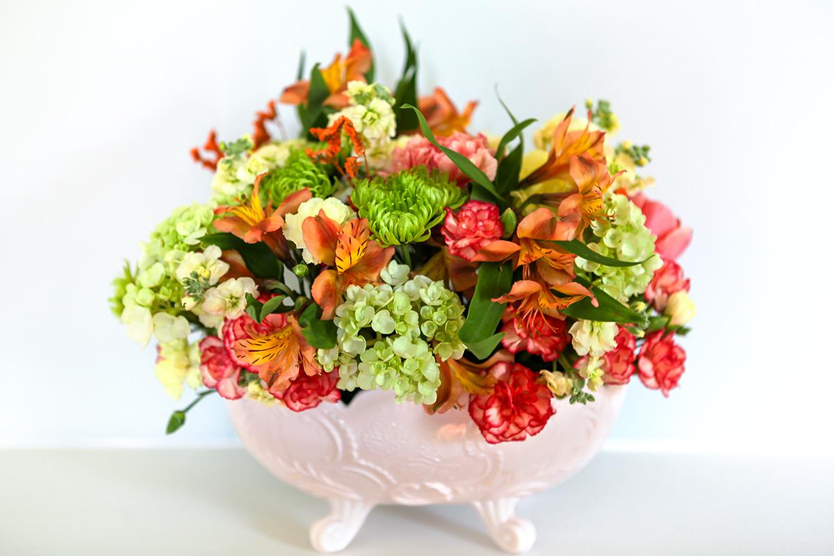 Here is my practice arrangement for my wedding centerpieces using Kroger flowers. I was working