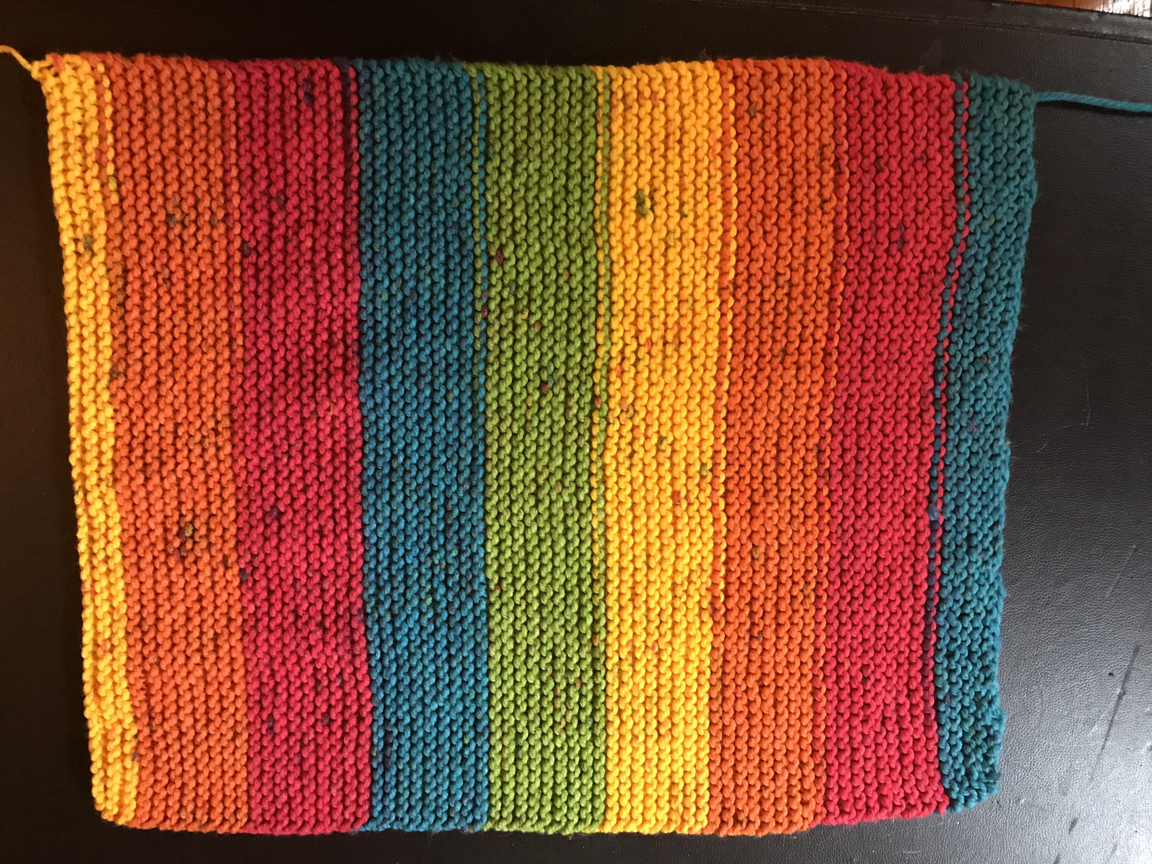 Just cast off my first baby blanket! Might add a white border to it