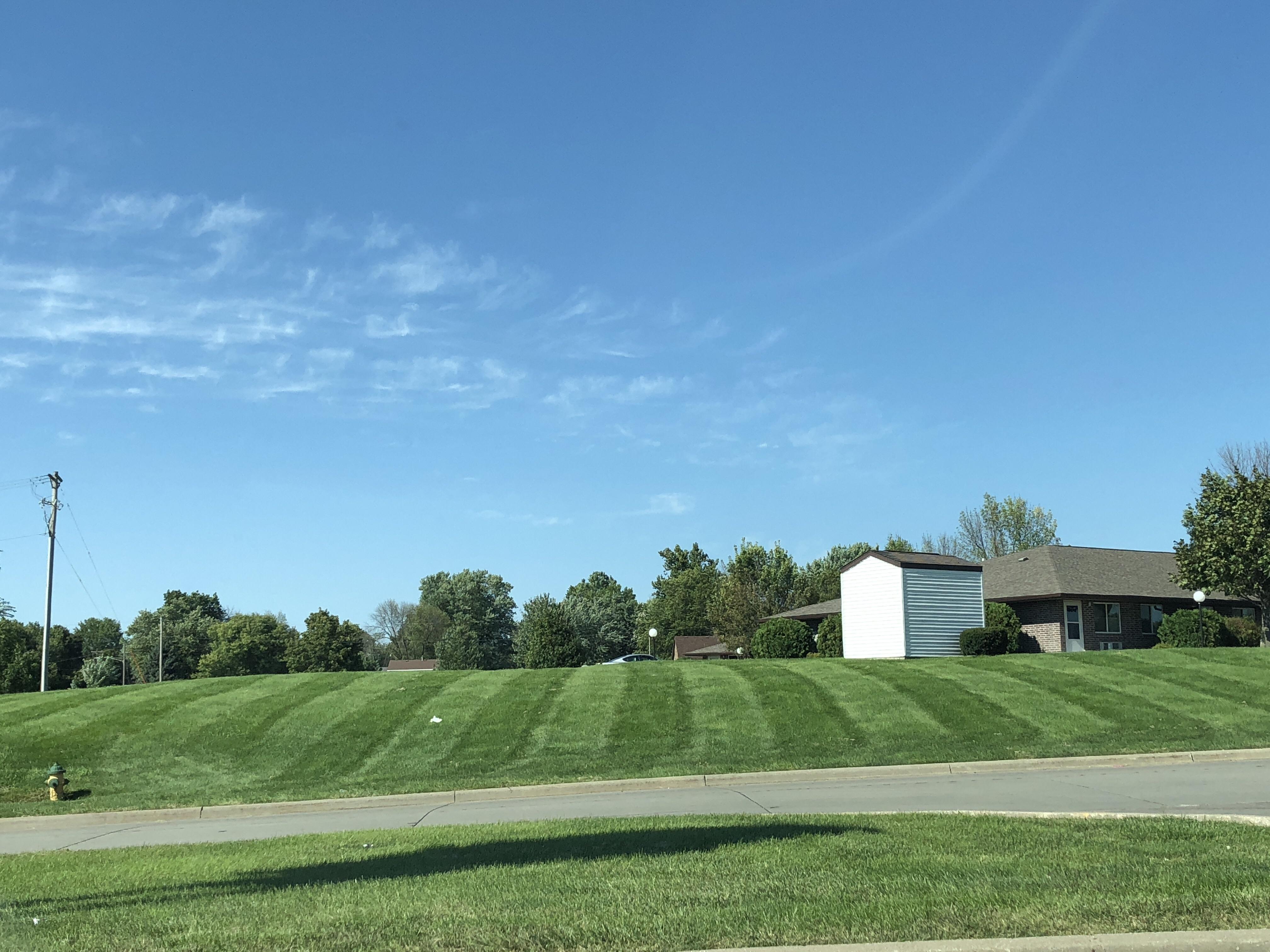 Great stripes with a small white barn r/satisfyinggrass