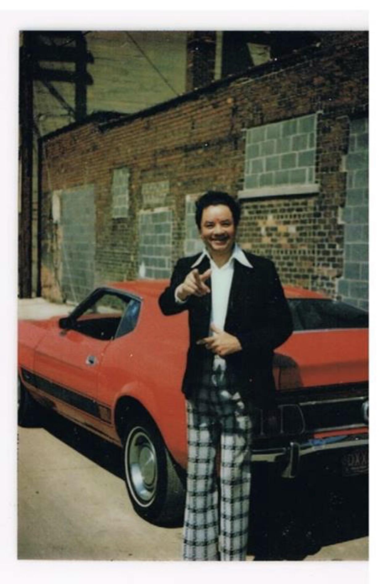 My great grandfather behind his used furniture store. Detroit MI. 1973