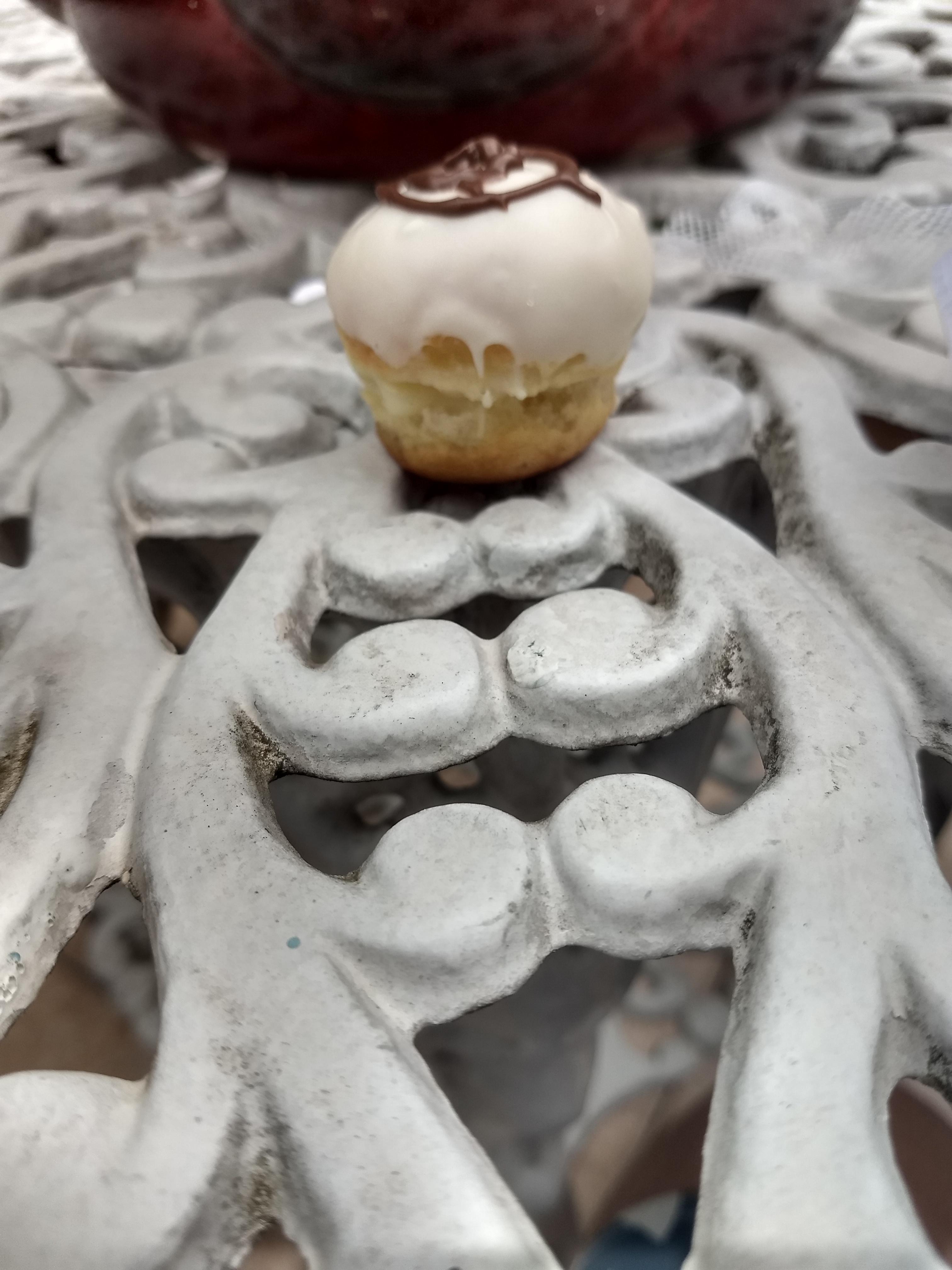 Mini cupcake, which is a mini version of a cupcake, which is already a