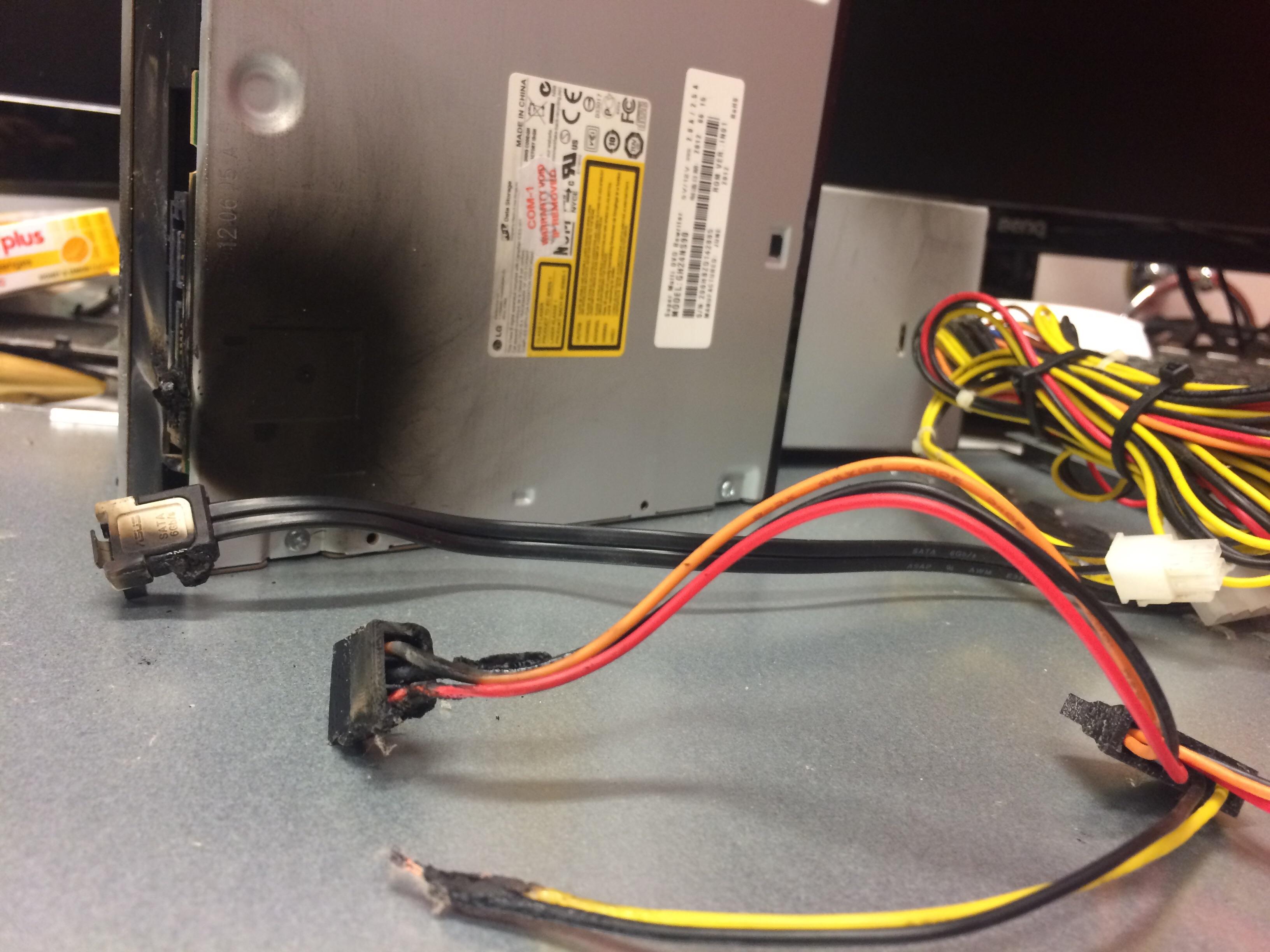DVD power cable caught fire. The bottom cables are the two halves. r