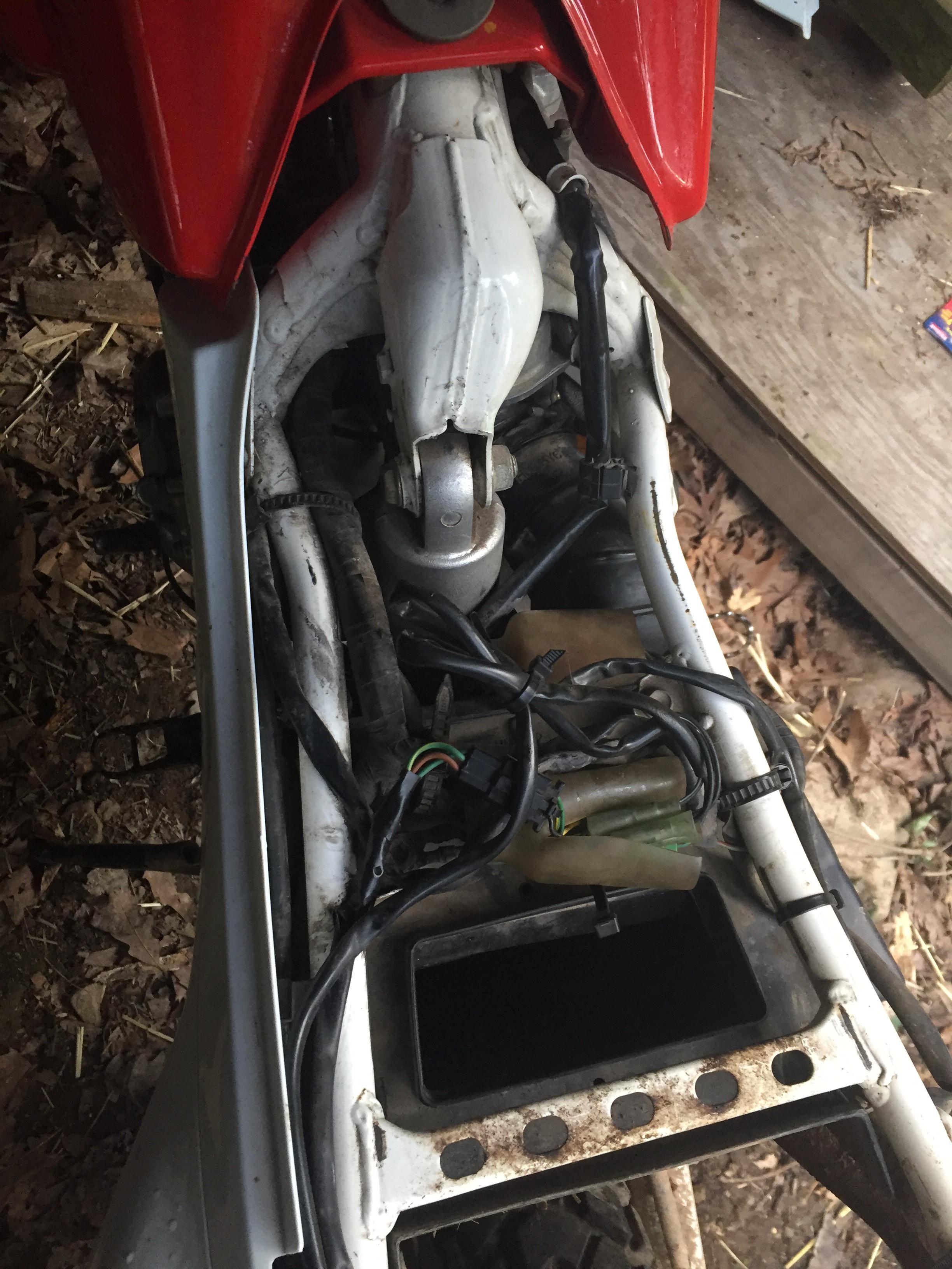 First time bike owner. 95 Xr650l. Battery died. Opened the seat up to