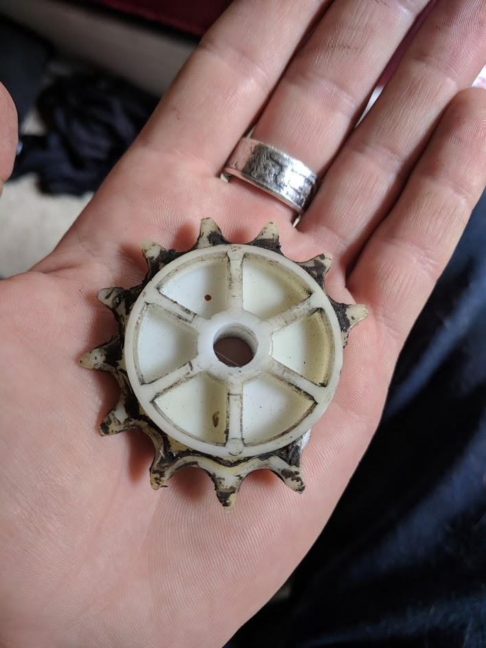 Broken idler sprocket on a Stanley garage door. r/fixit