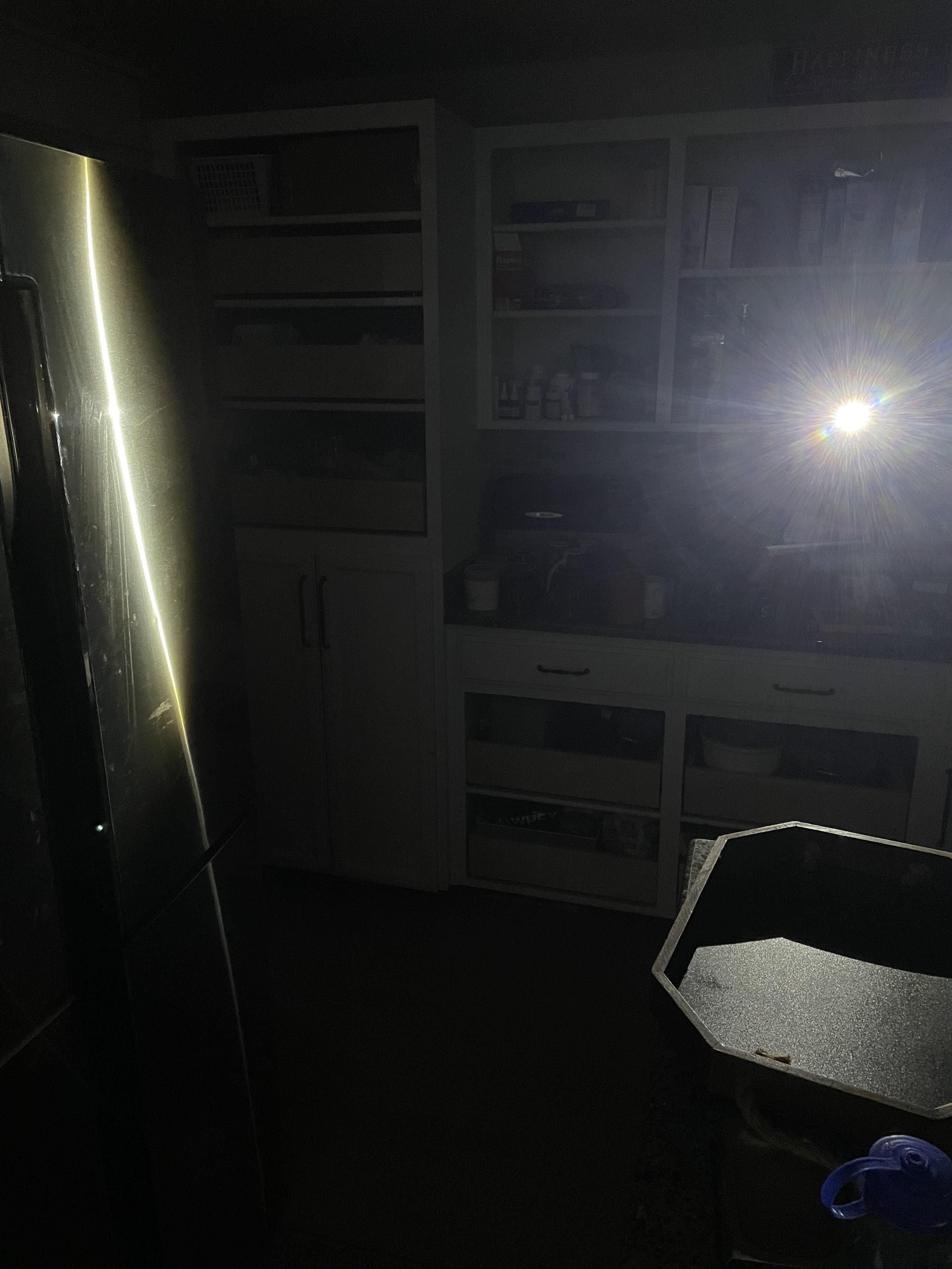 Can anyone explain what the long line of light is on my refrigerator? I