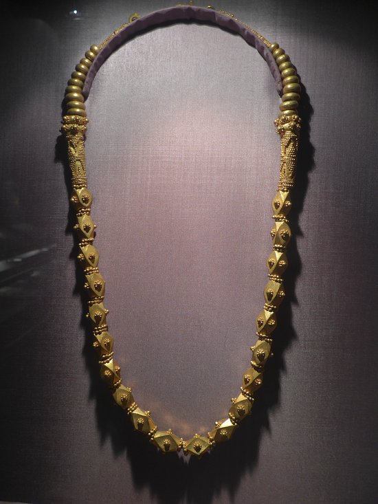 A finely crafted 10th century gold necklace, displayed at the Ayala